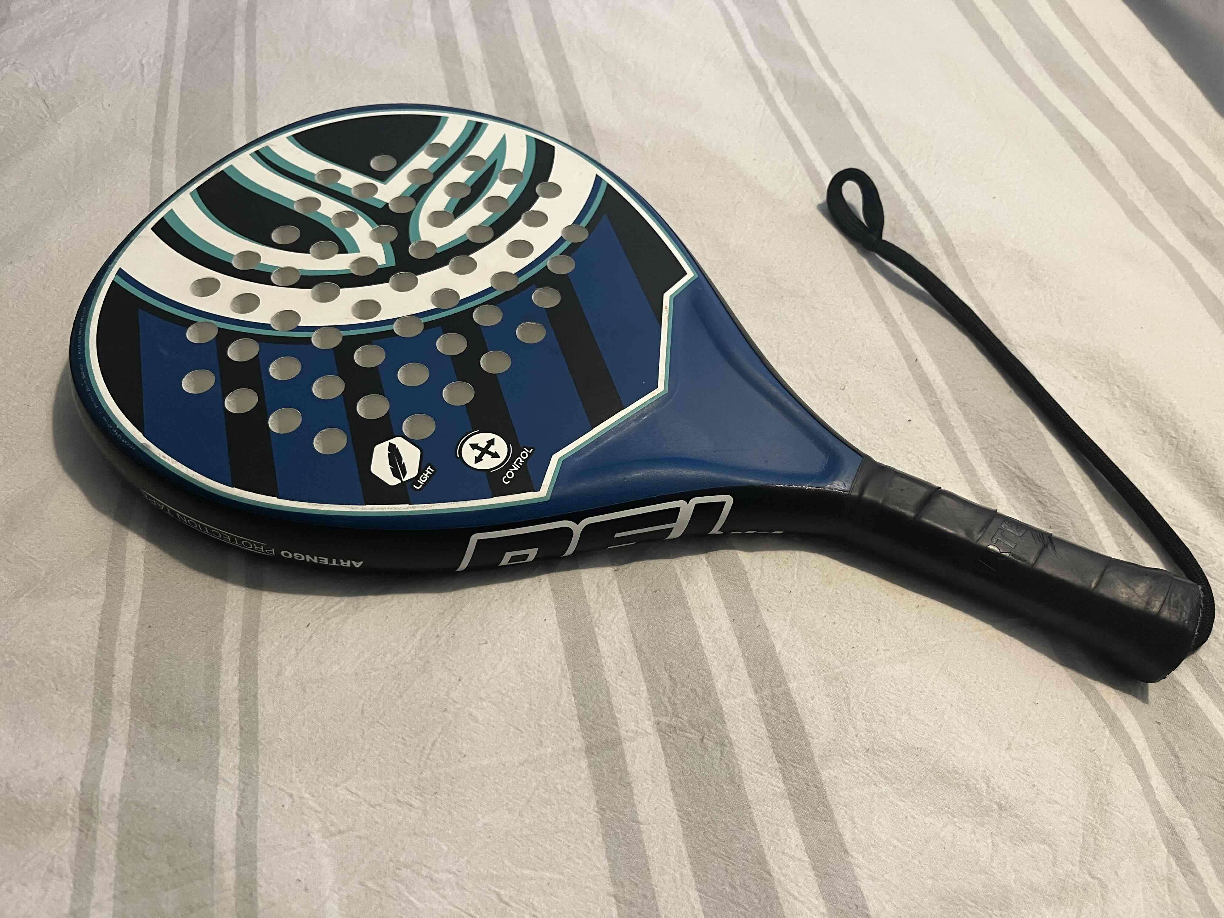 Pala de padel azul y negro - miniatura 1