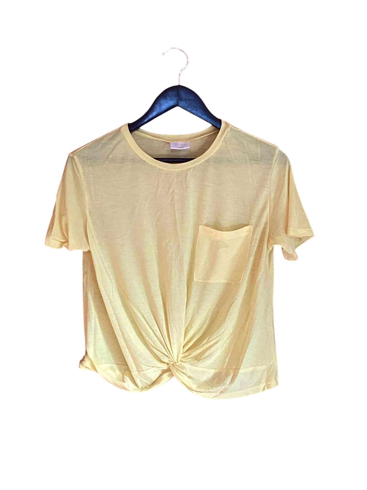 Polera amarilla con bolsillo - miniatura 1