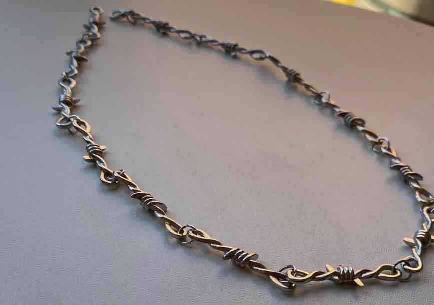 cadena de púas de metal - miniatura 1