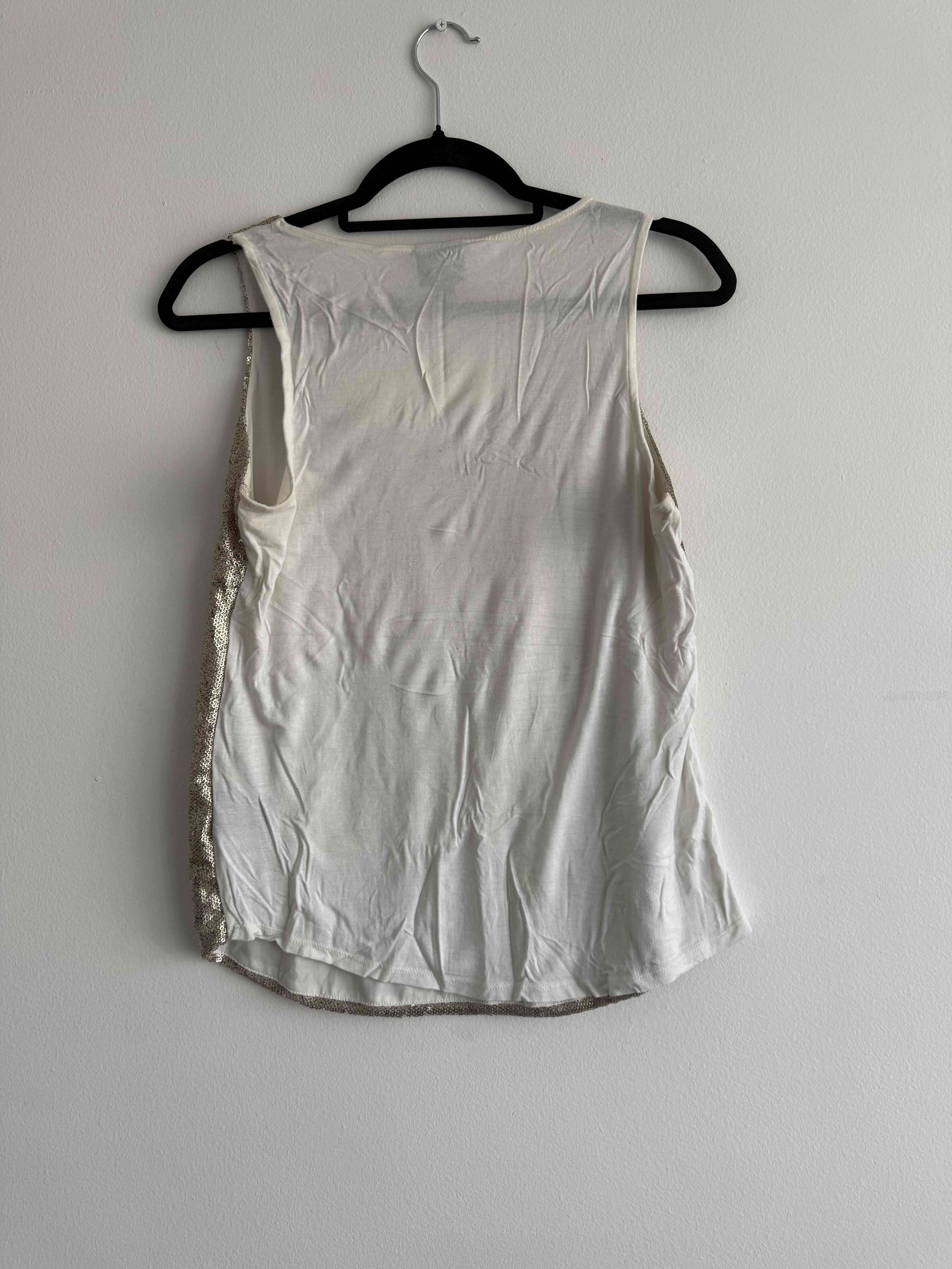 Polera dorada sin mangas - miniatura 2