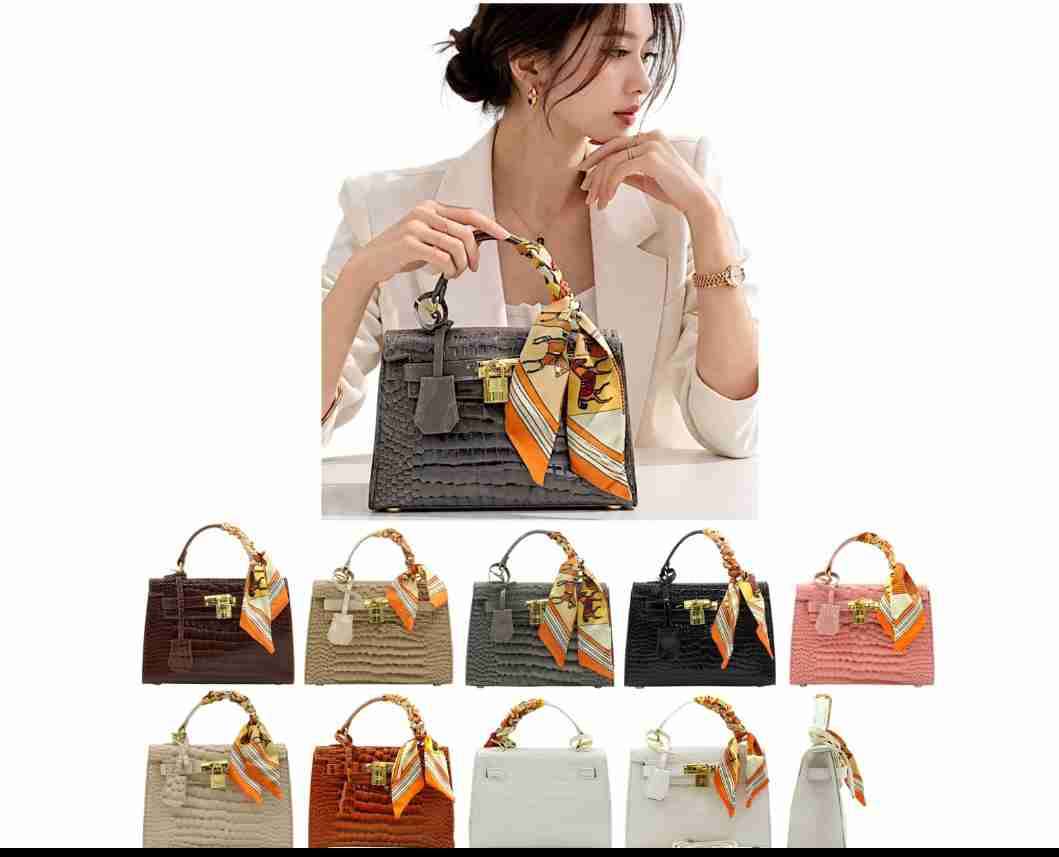 Cartera de mano con diseño texturizado - miniatura 1