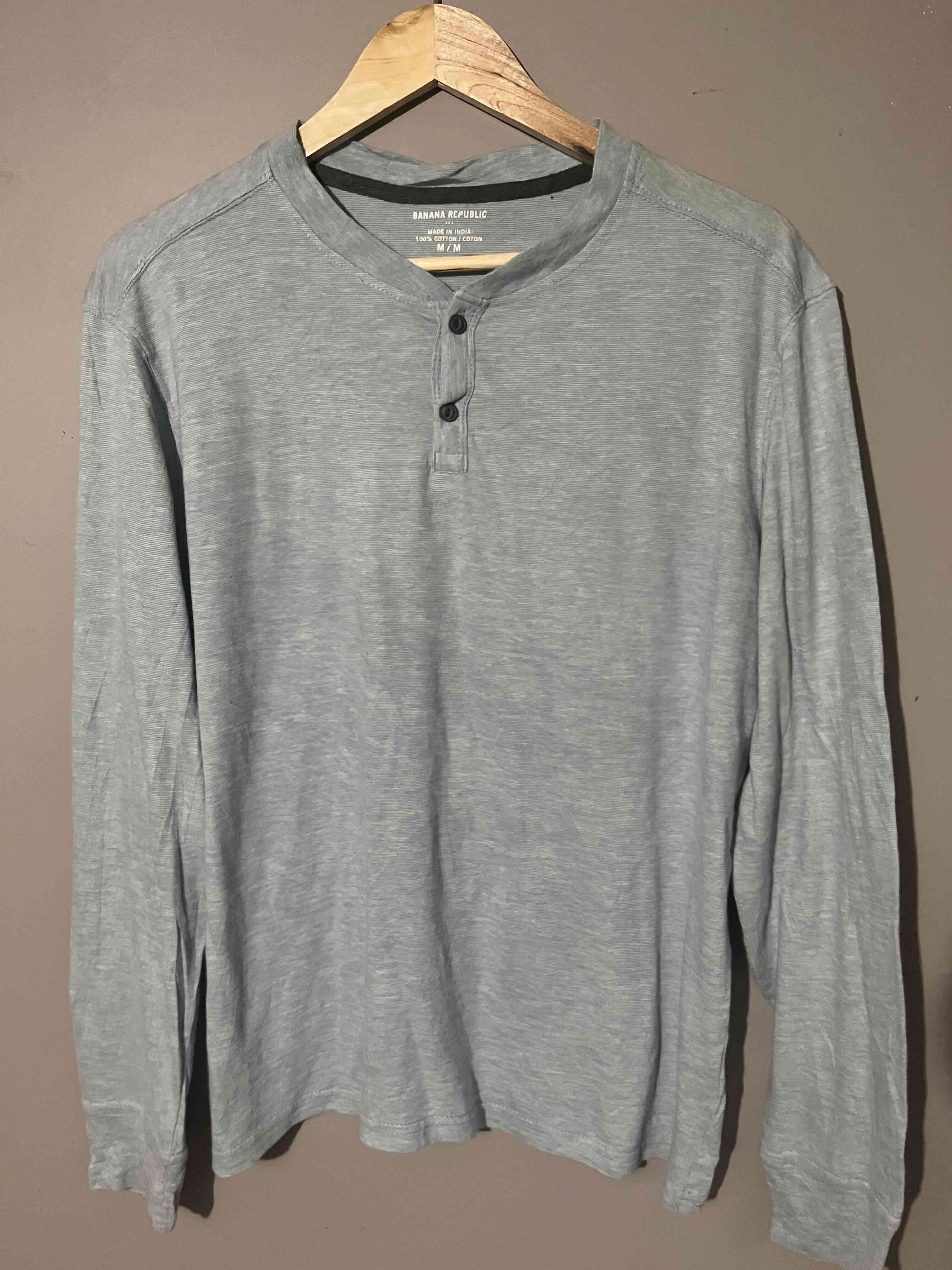 Polera gris manga larga - miniatura 1