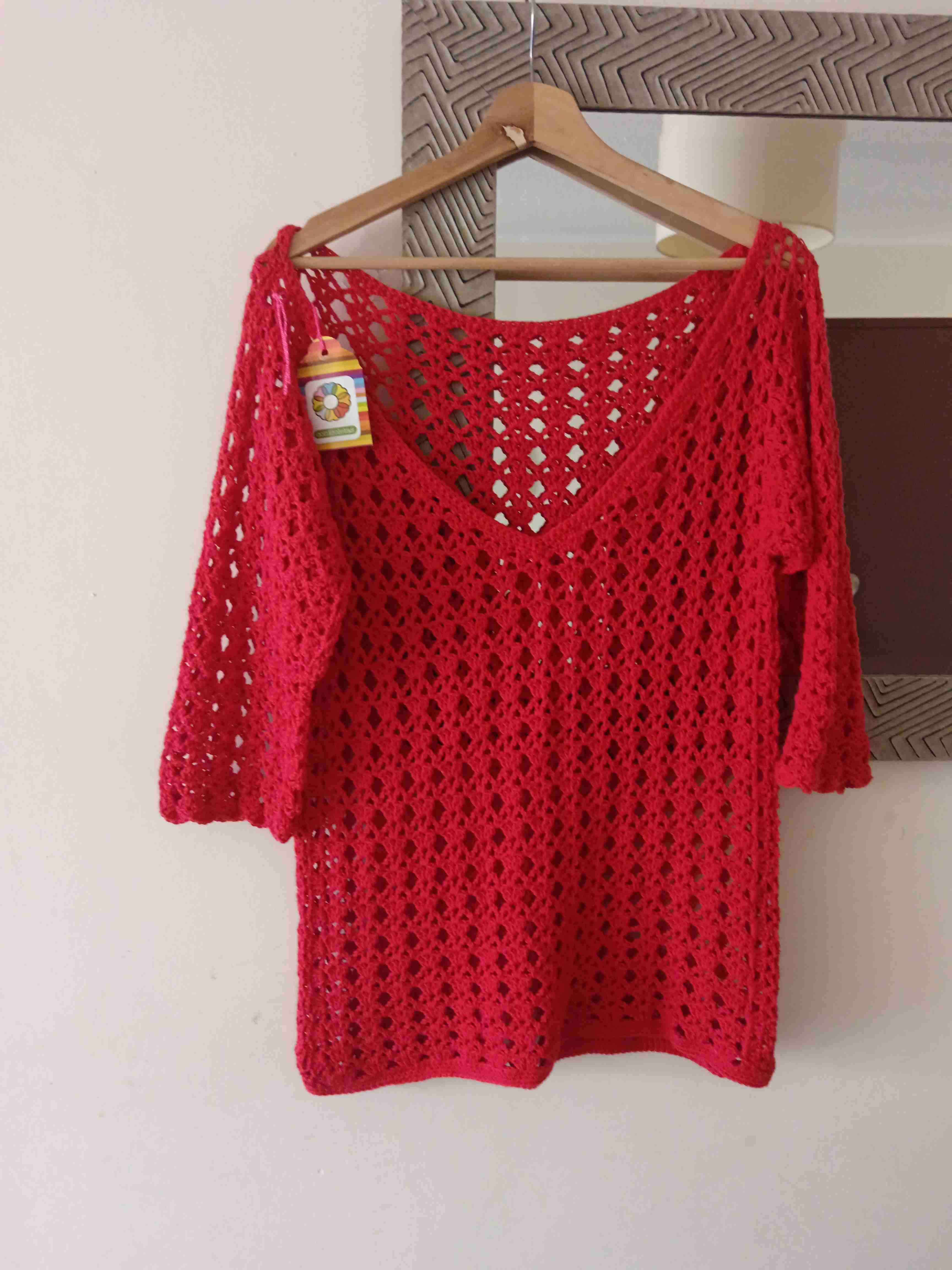 Chaleco rojo de tejido abierto