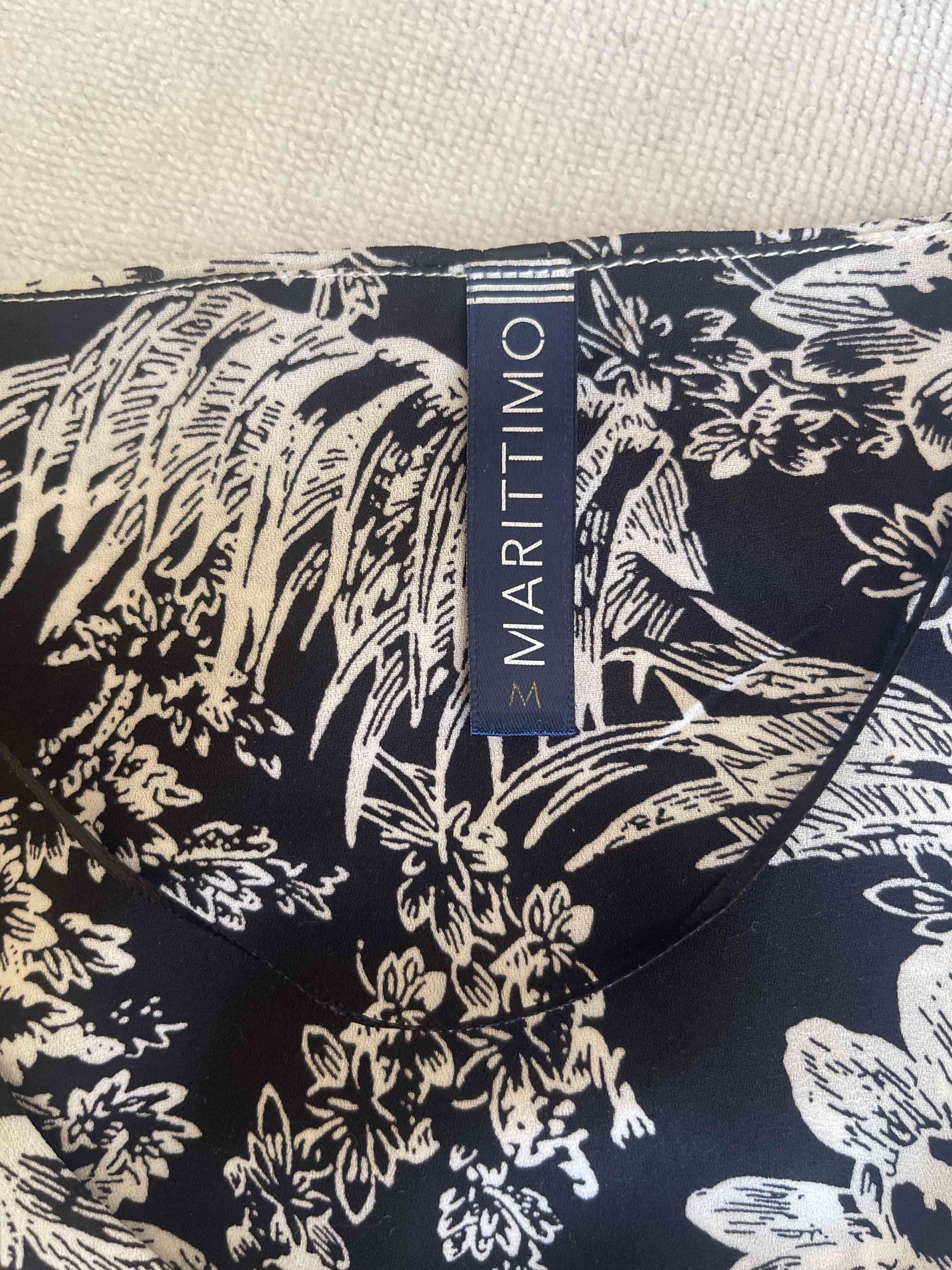 Blusa floral sin mangas - miniatura 2