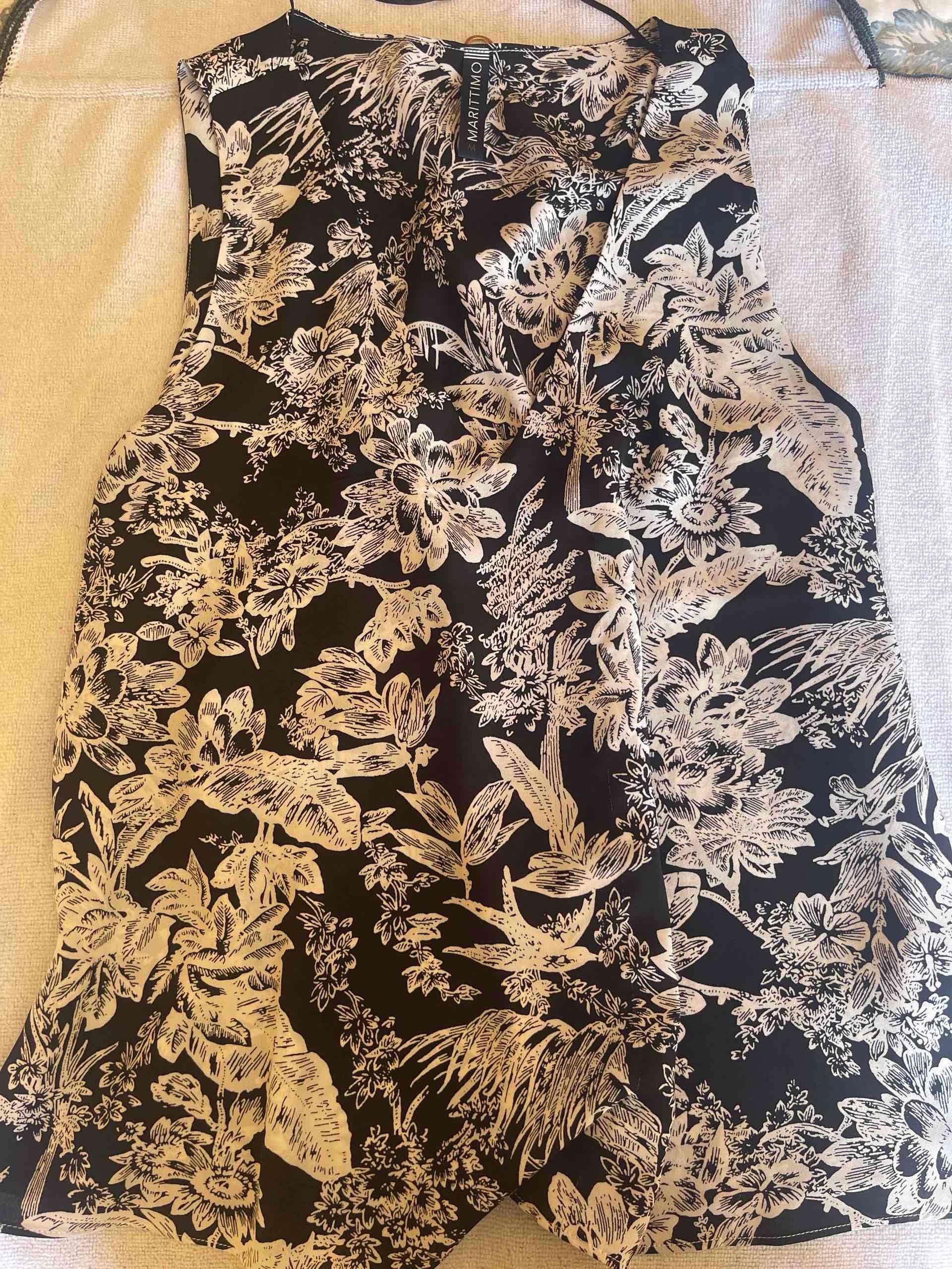 Blusa floral sin mangas - miniatura 3