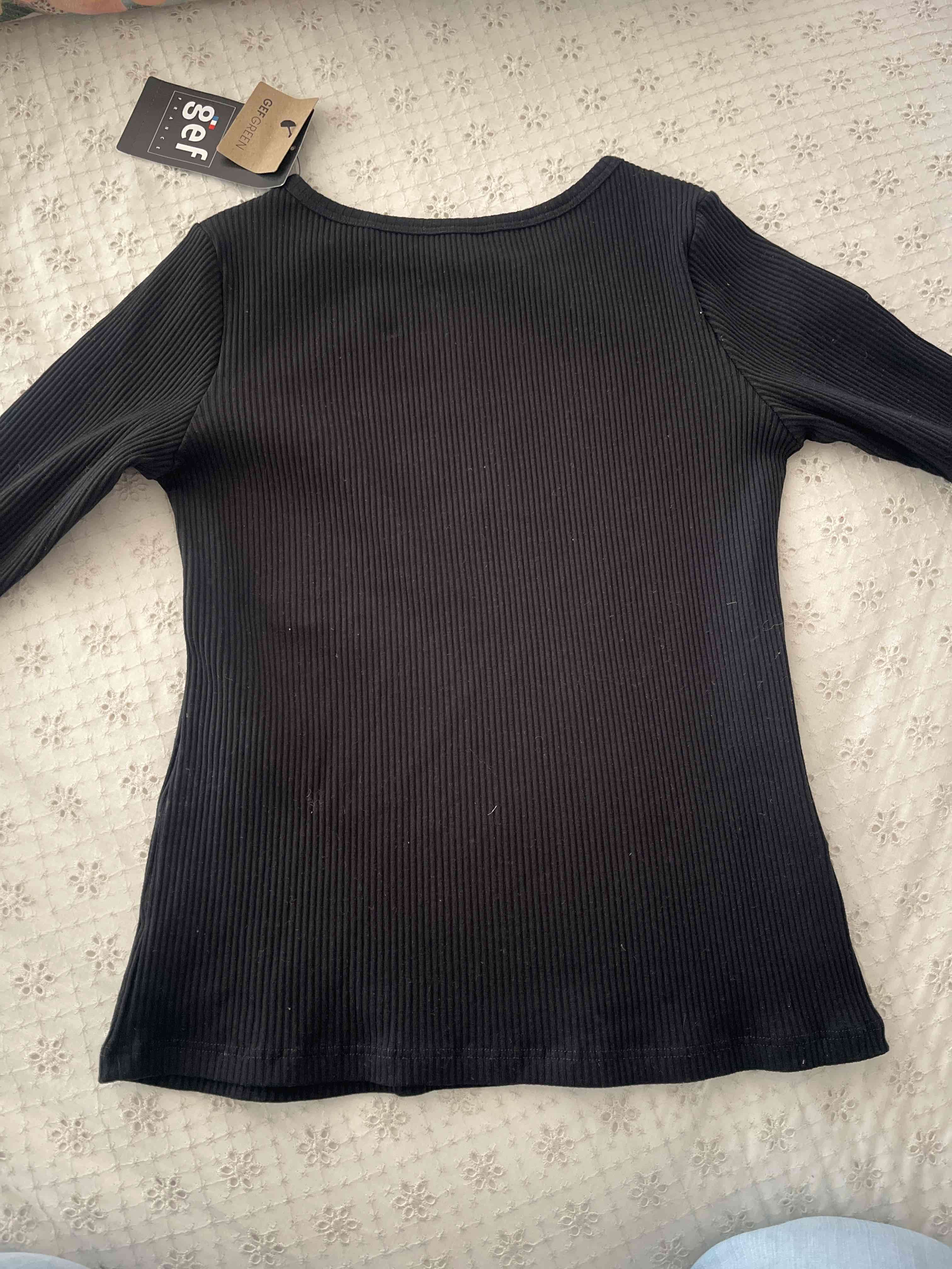 Polera negra con estrella 12 - miniatura 3