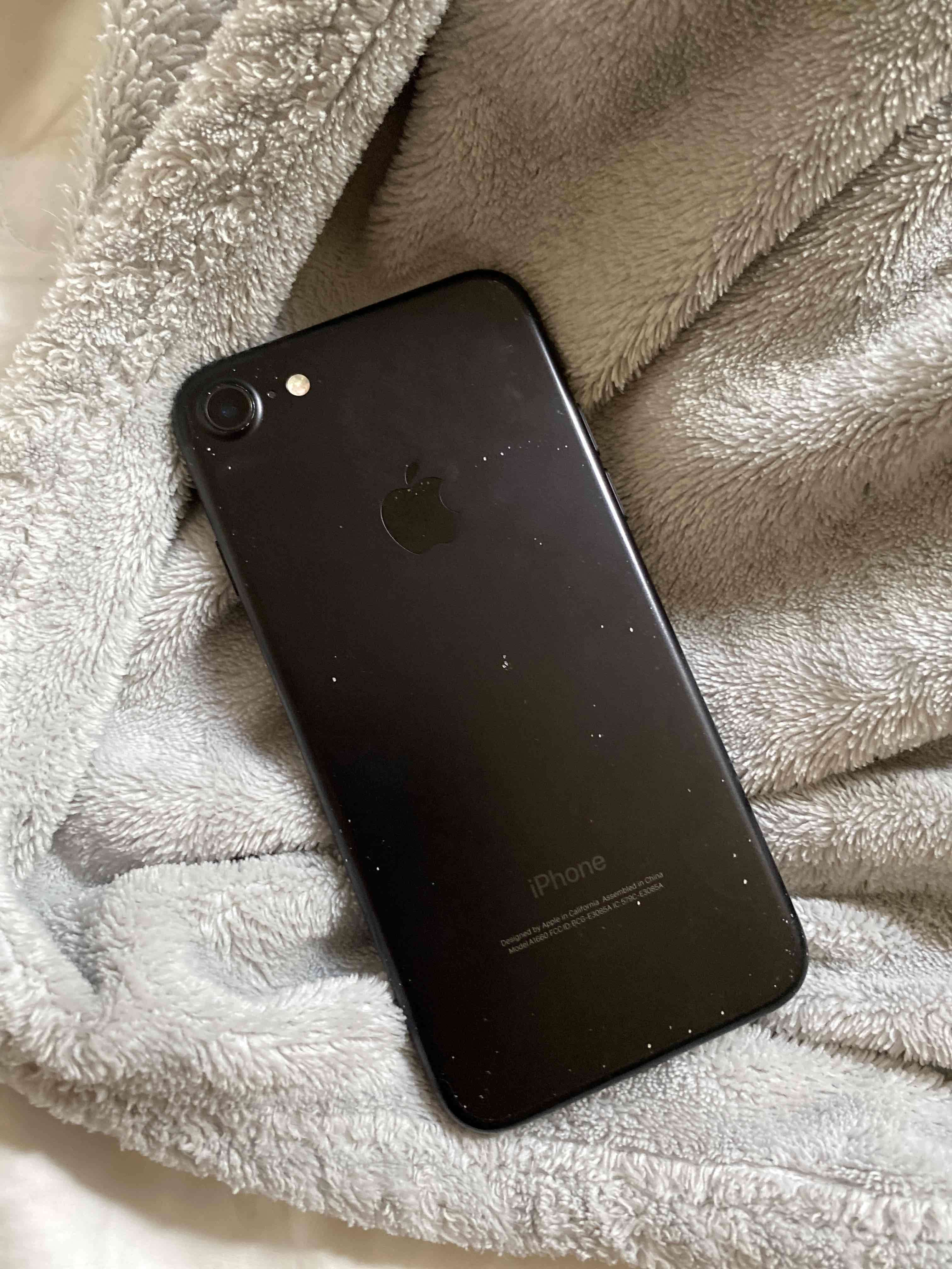 Teléfono móvil negro usado - miniatura 2