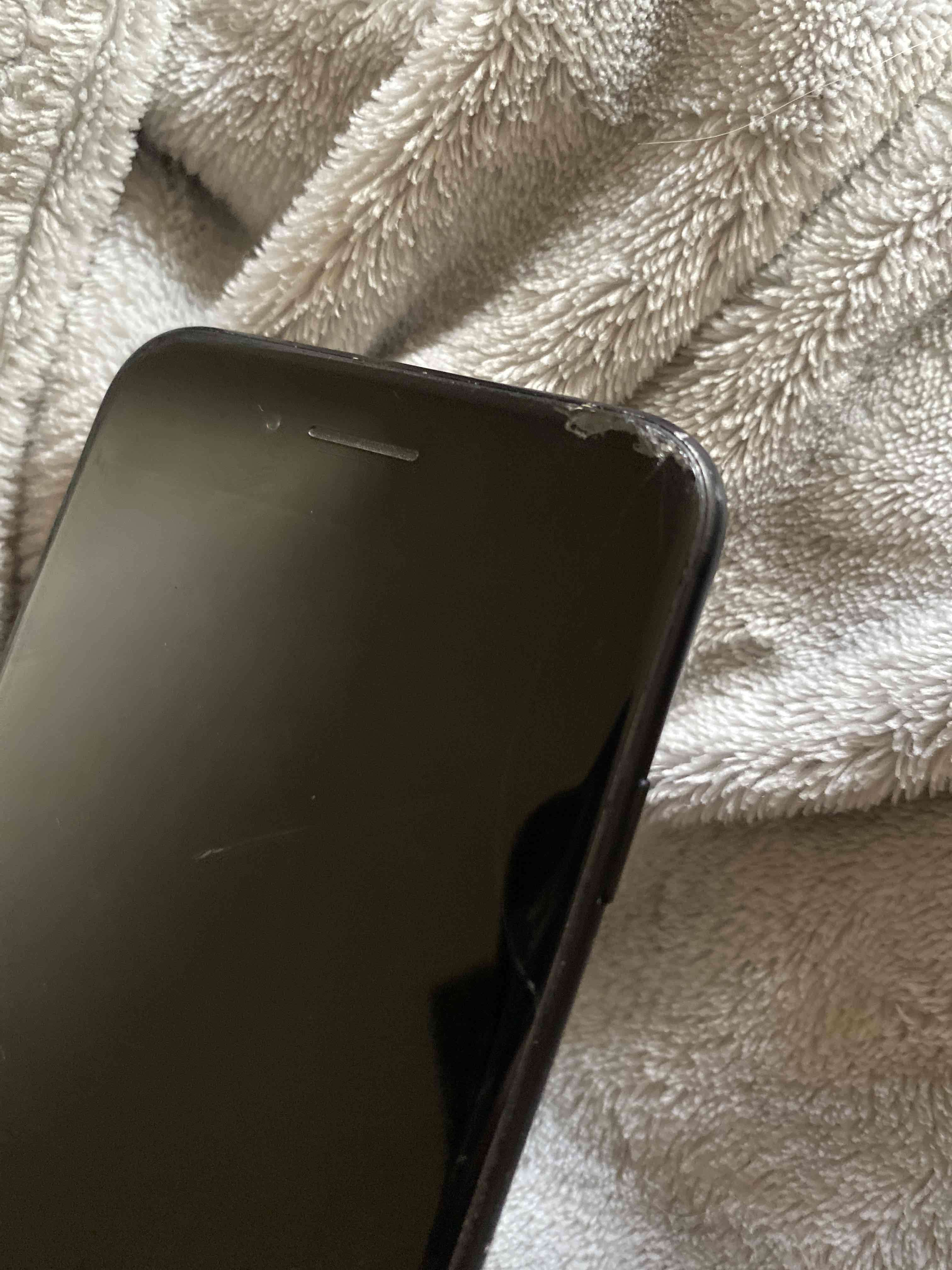 Teléfono móvil negro usado - miniatura 3