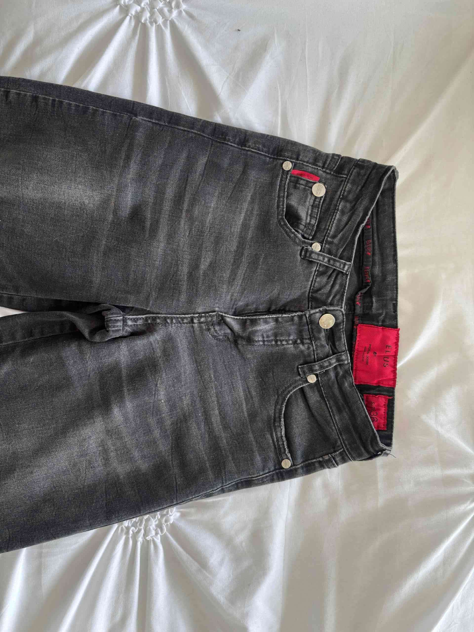 Jeans oscuros para mujer - miniatura 1