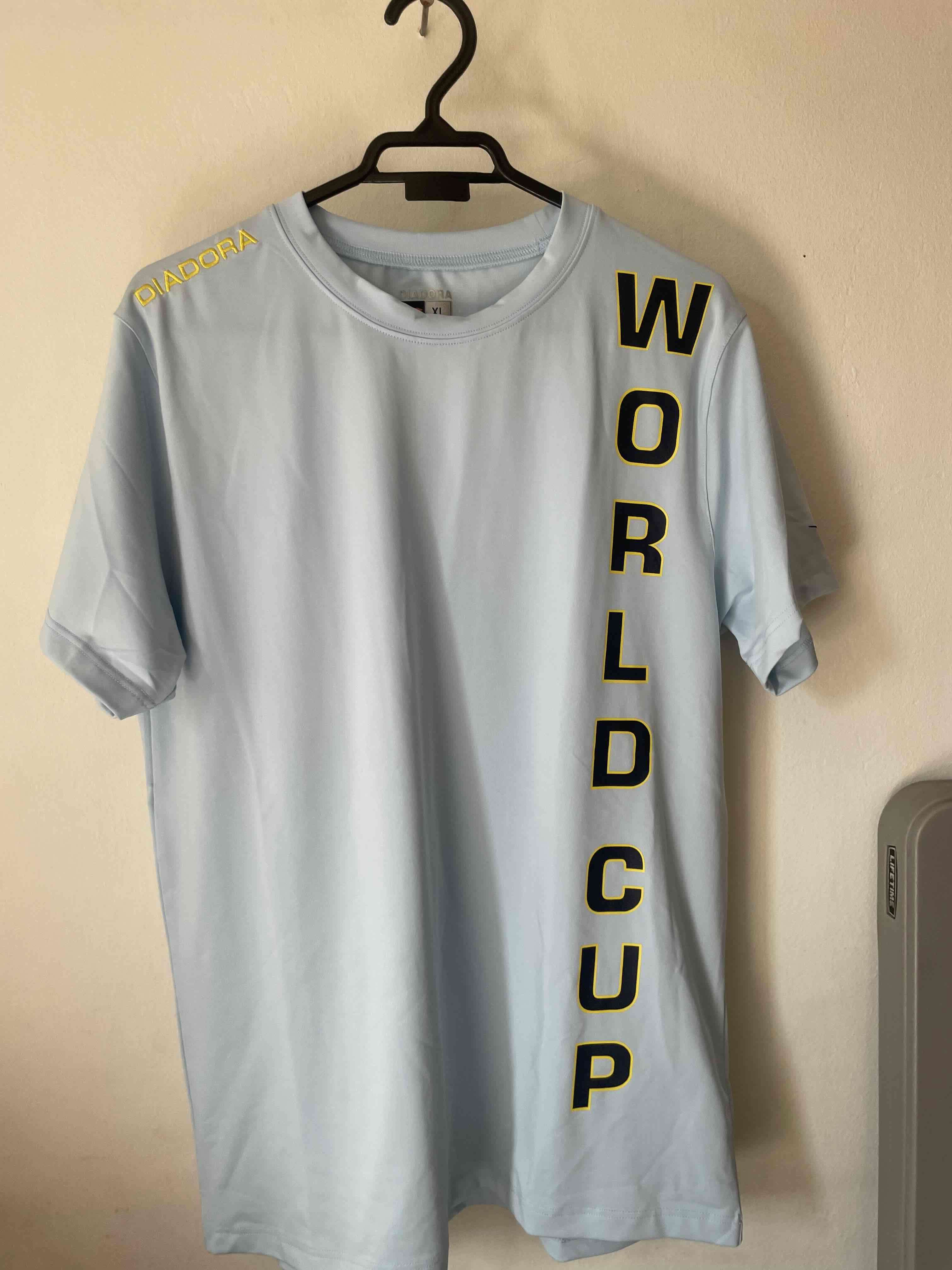 Polera Diadora  celeste - miniatura 1