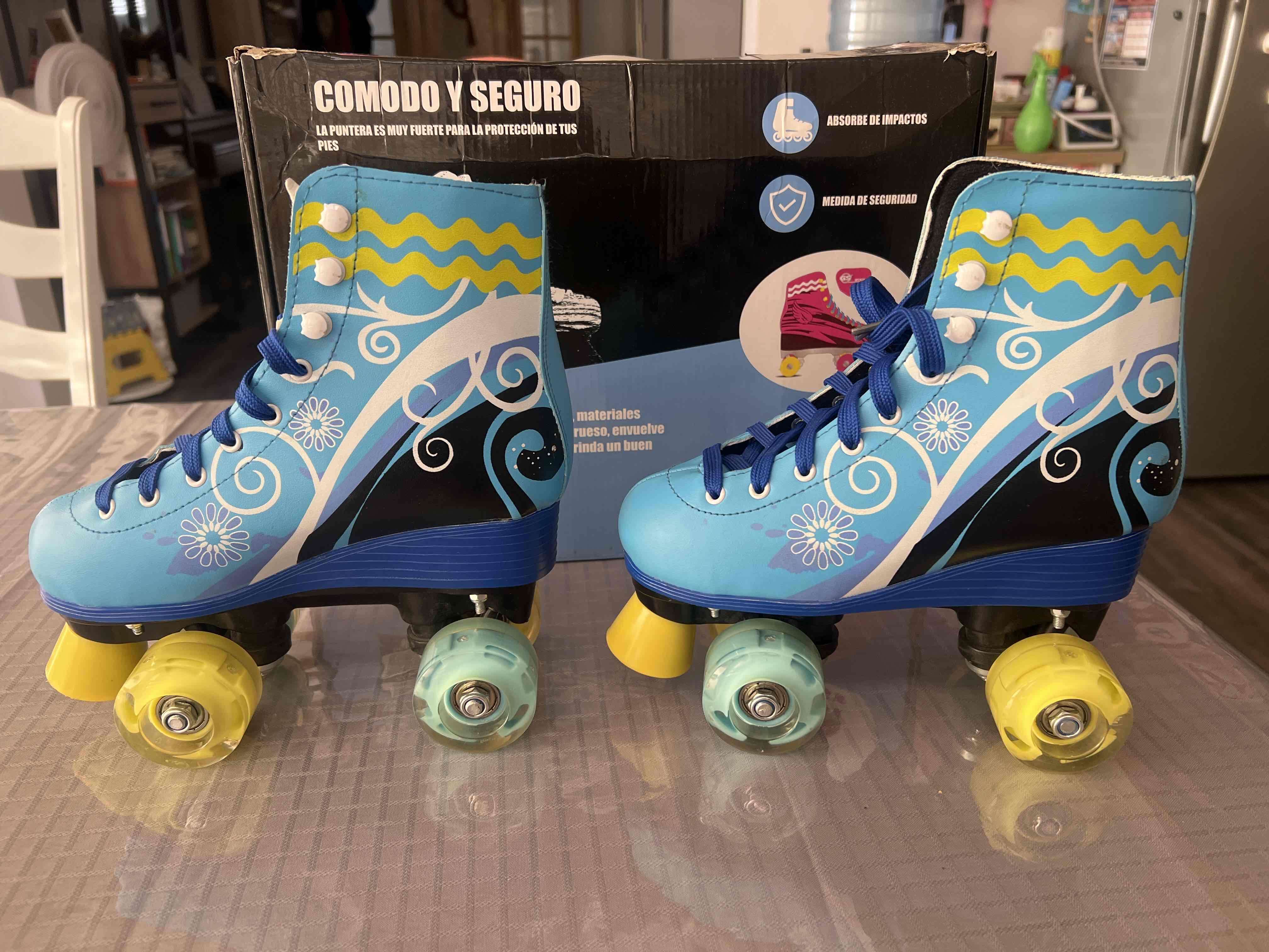 Patines de cuatro ruedas azules - miniatura 2