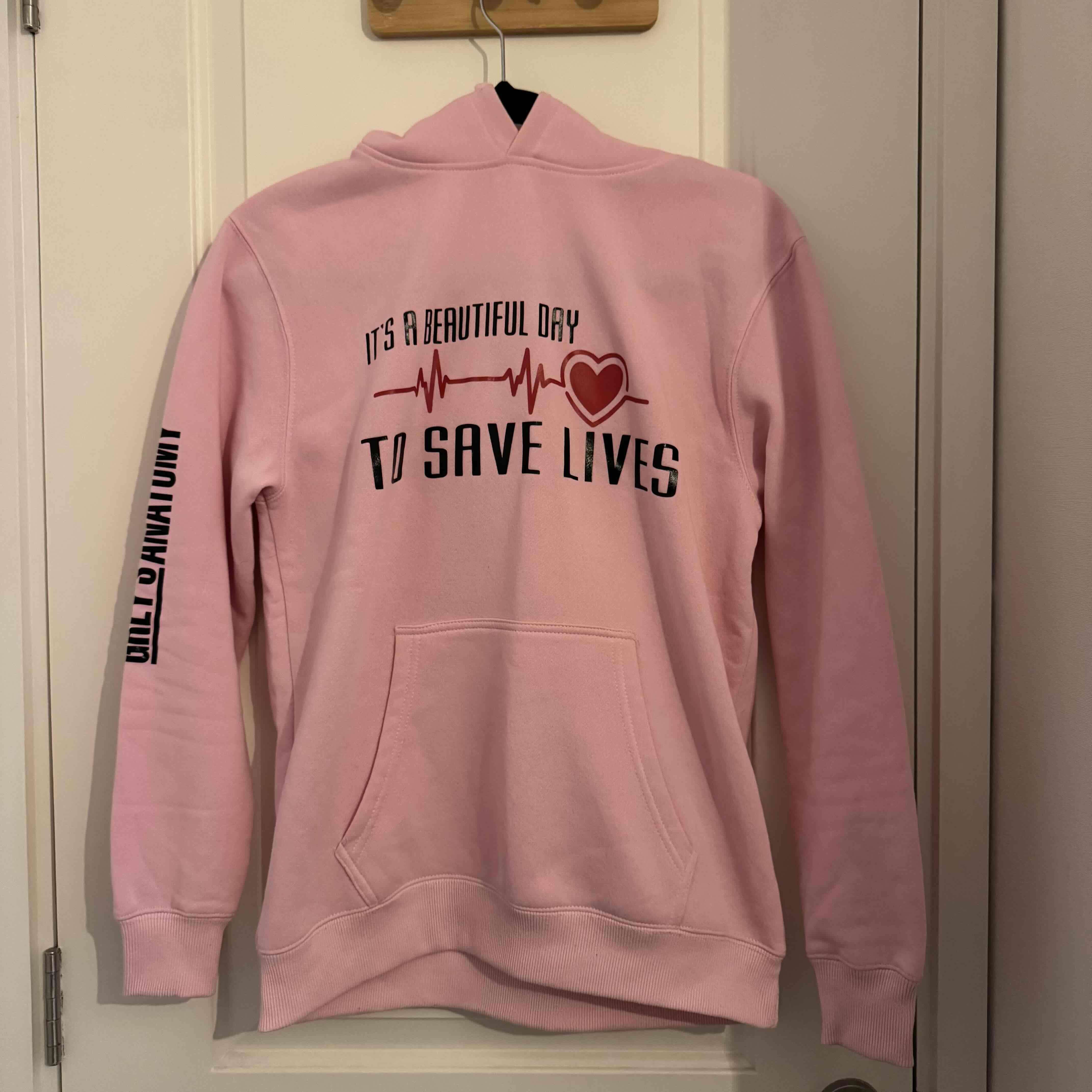 Polerón rosa con capucha y diseño - miniatura 1