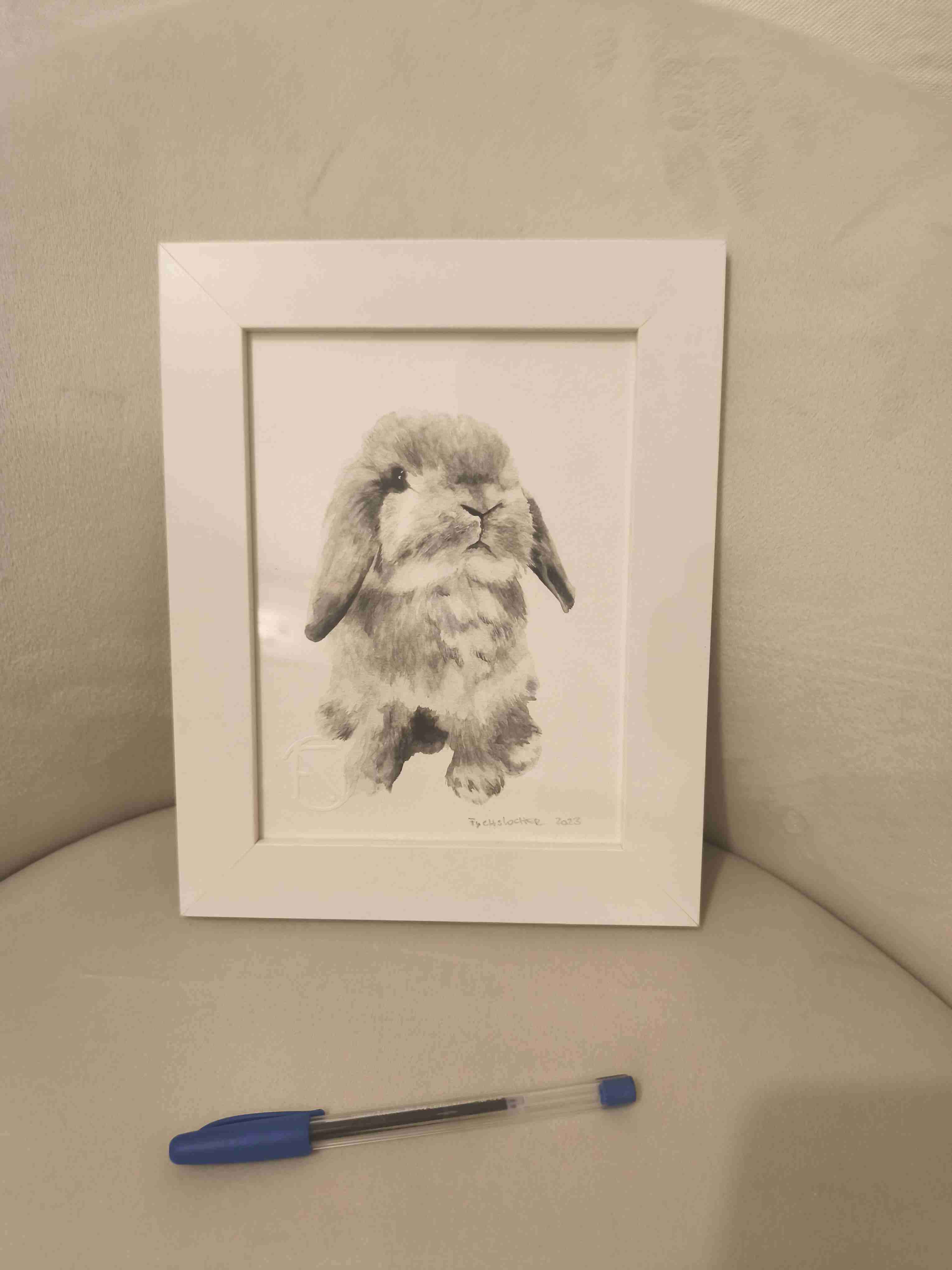 Cuadro de conejo enmarcado blanco