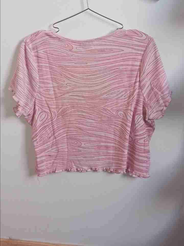 Polera rosa con mariposa - miniatura 2