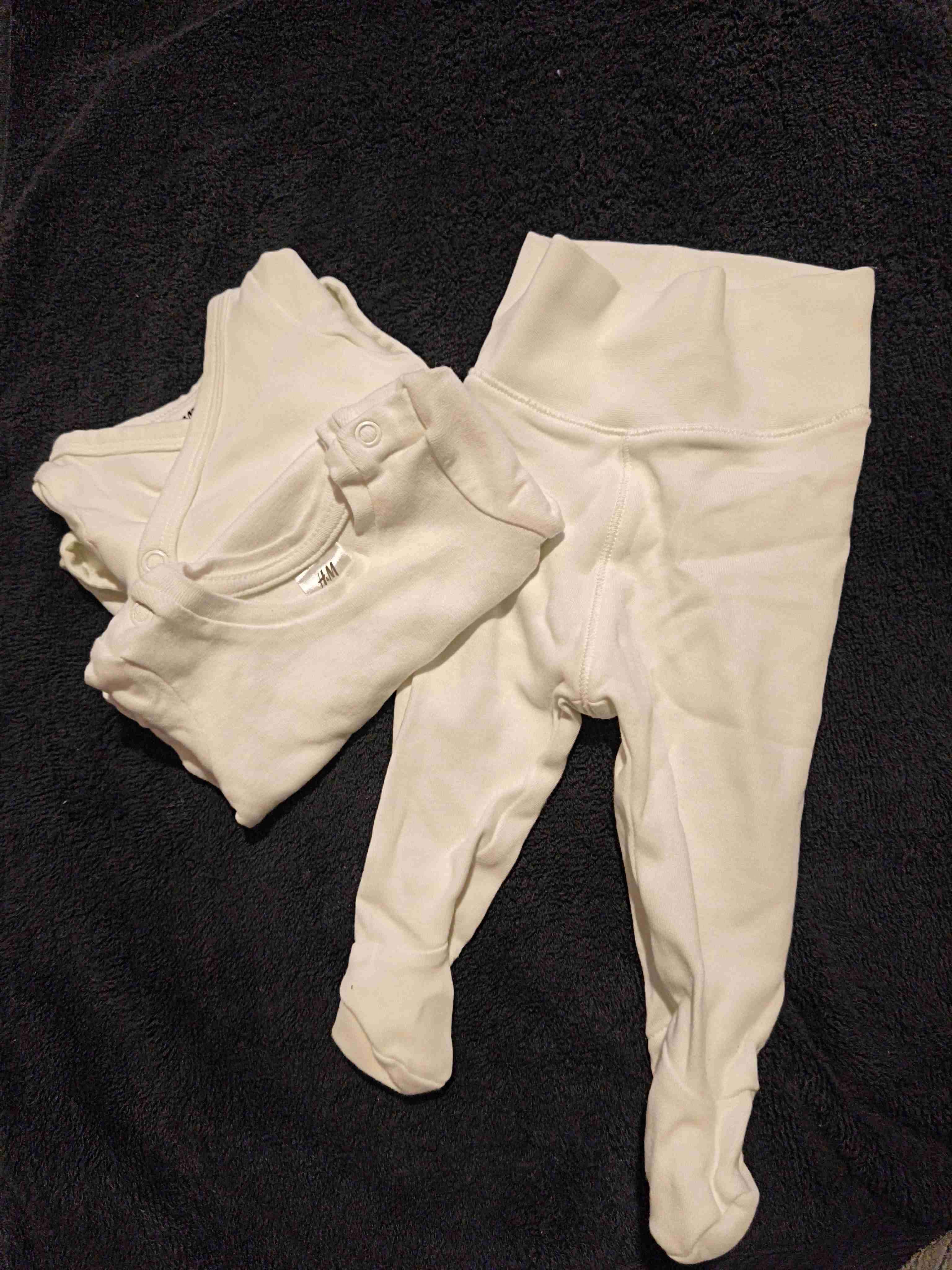 Conjunto de ropa bebé blanca