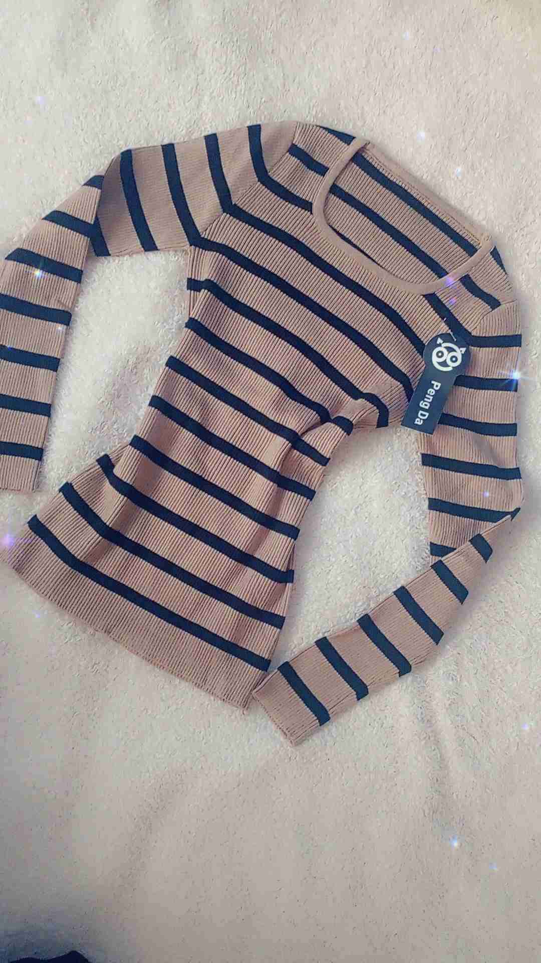 Suéter a rayas beige y negro - miniatura 2