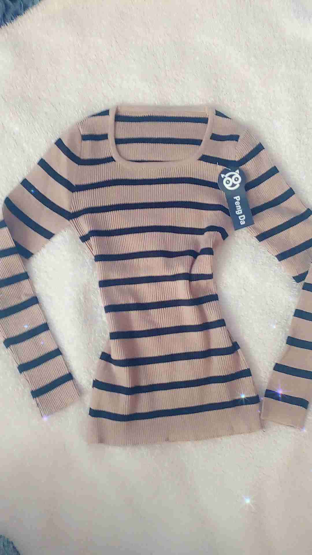 Suéter a rayas beige y negro - miniatura 3