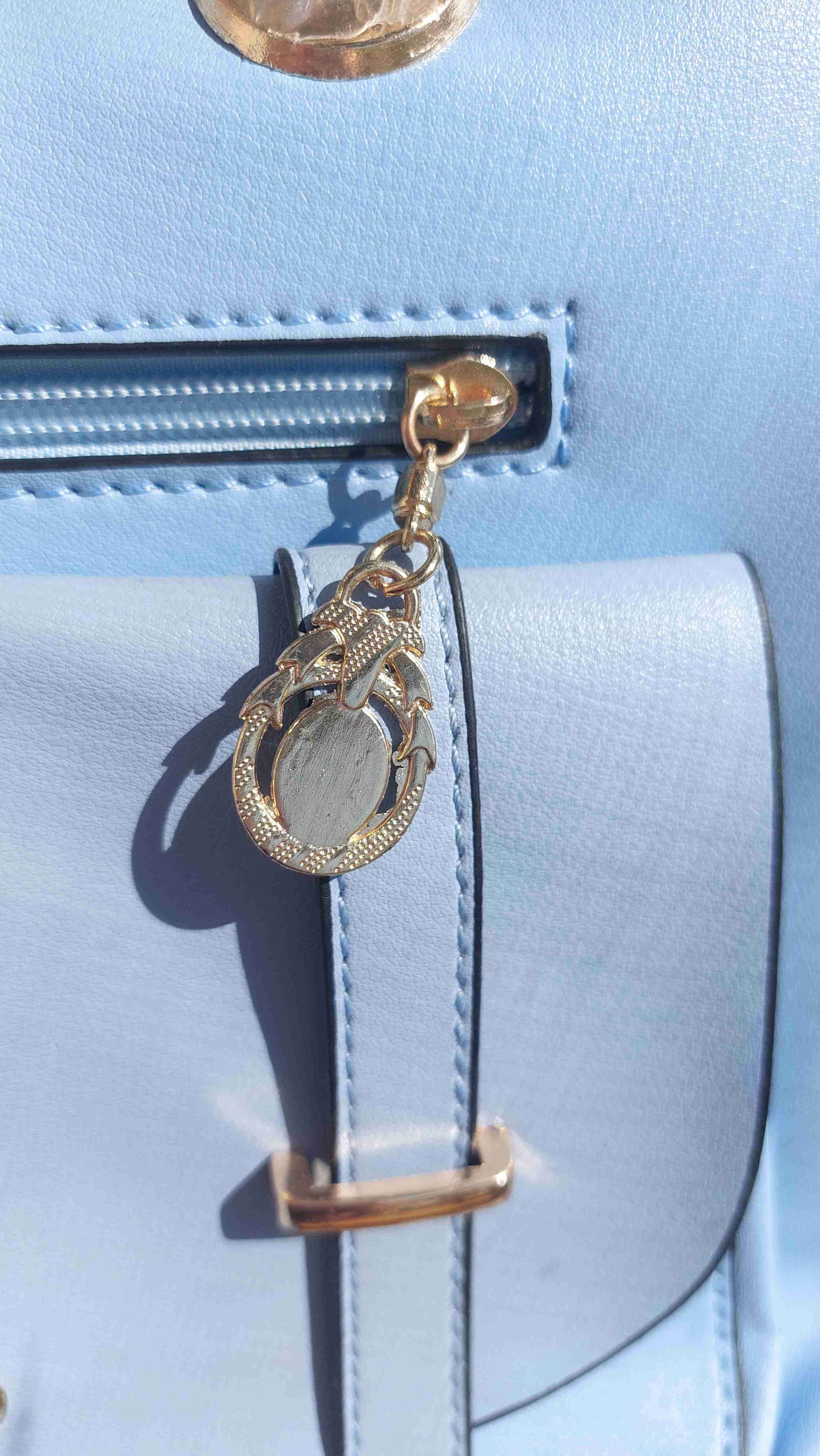 Mochila celeste con llavero de osito - miniatura 5