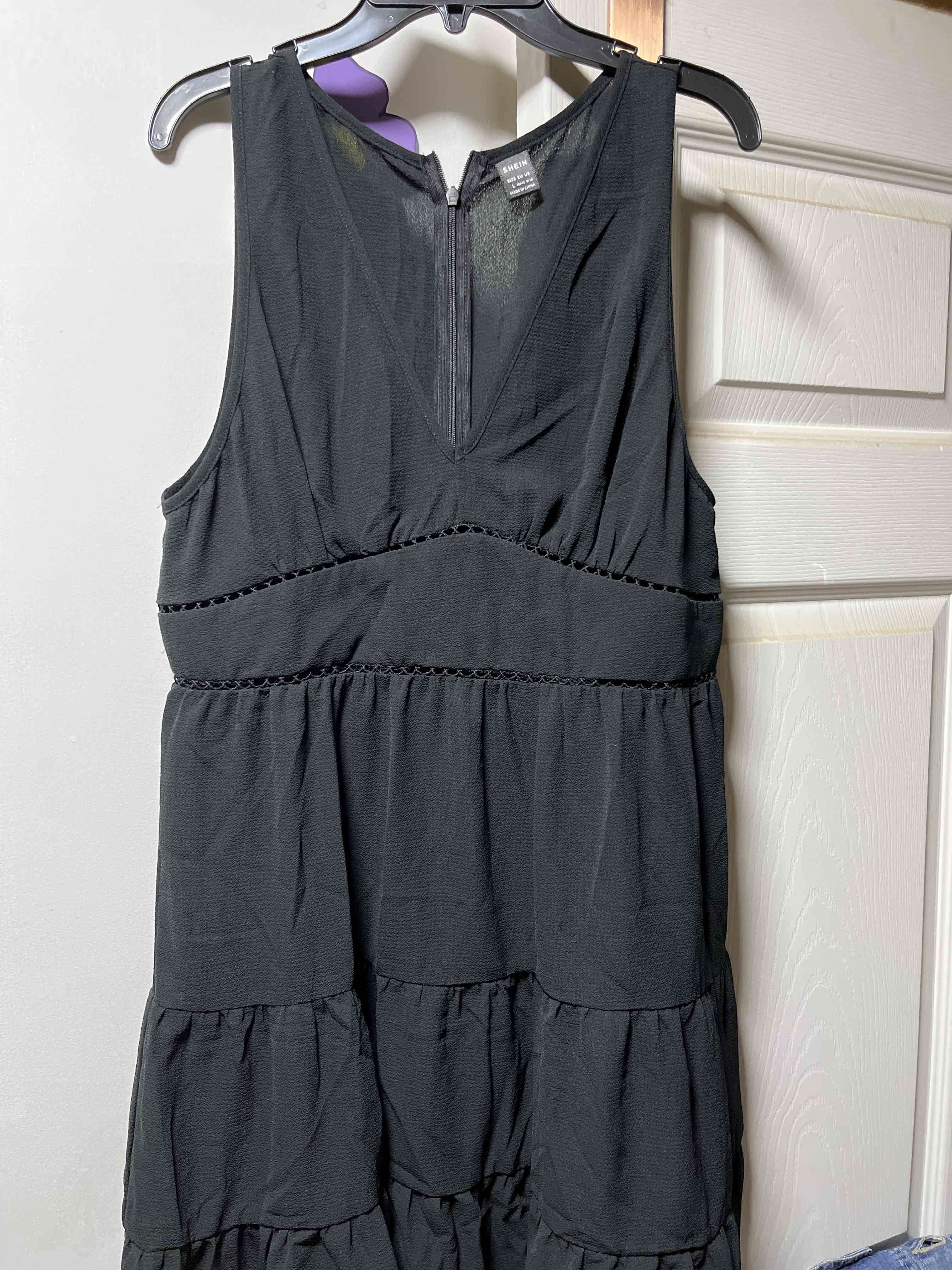 Vestido negro sin mangas - miniatura 1