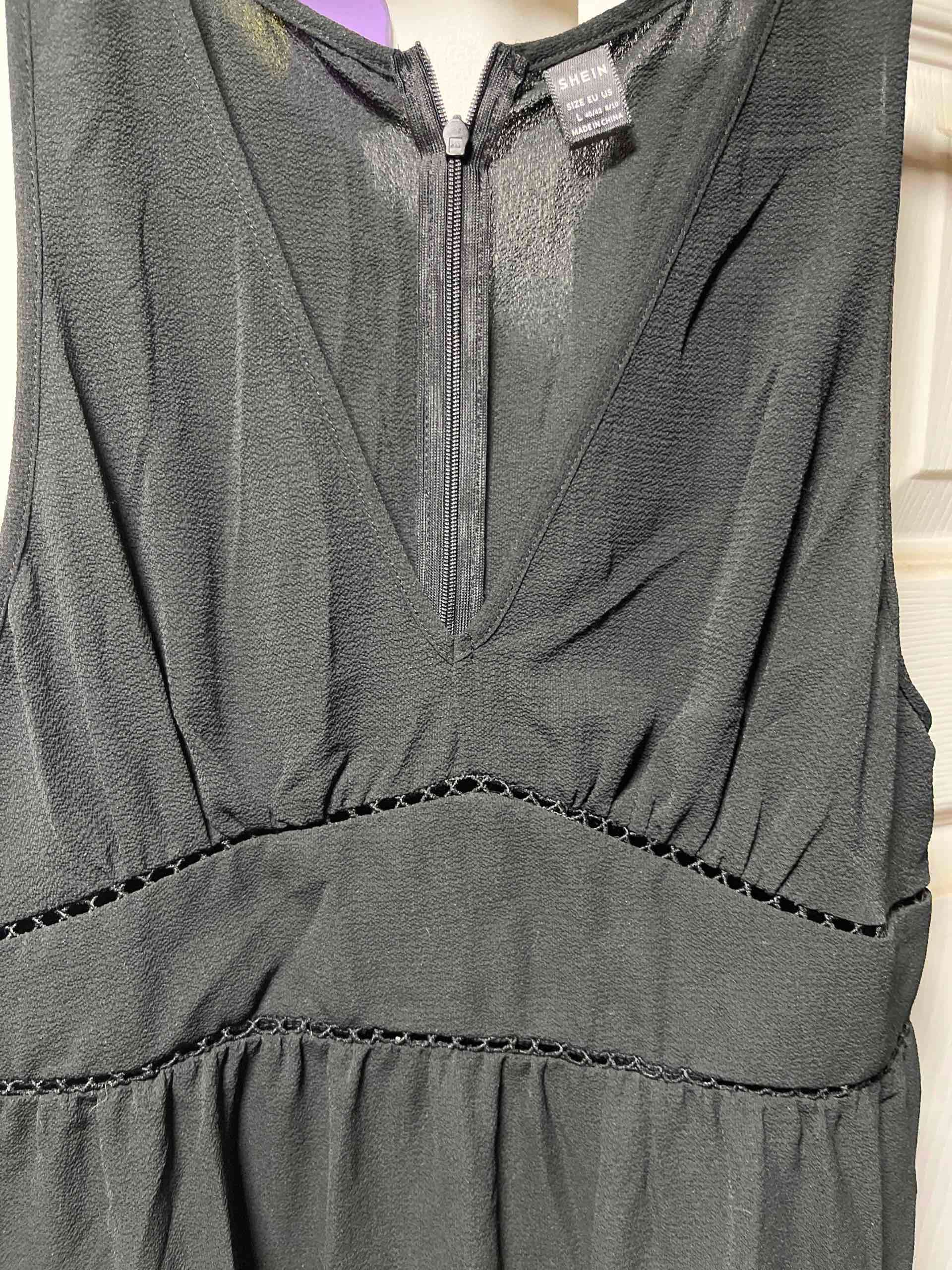 Vestido negro sin mangas - miniatura 5