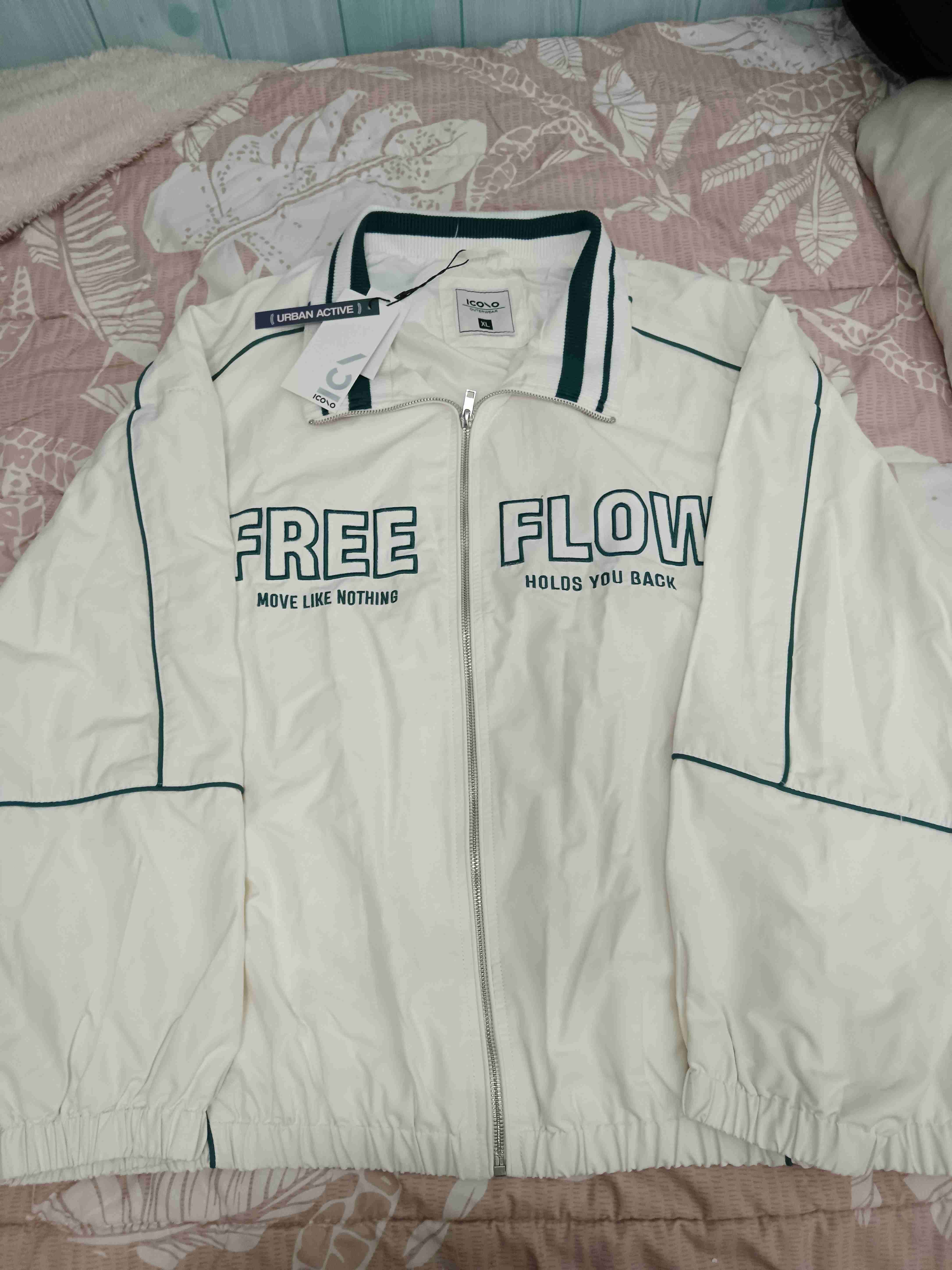 Chaqueta deportiva blanca 'Free Flow' - miniatura 1