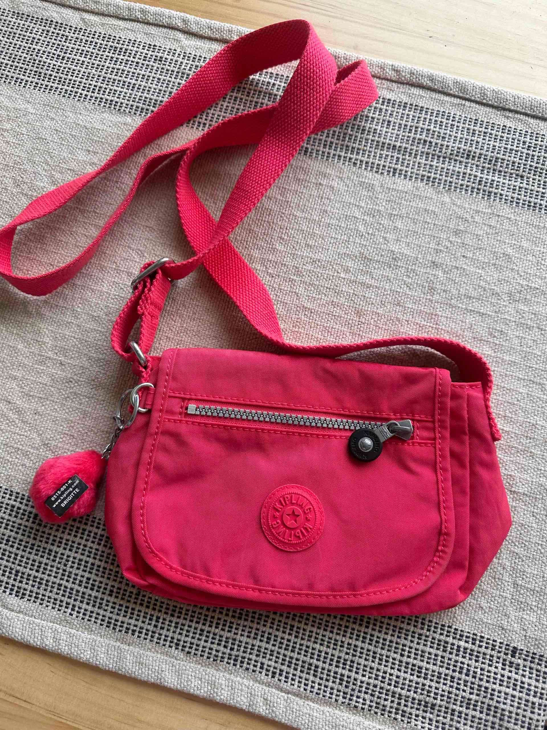 Cartera Kipling rosa cruzada