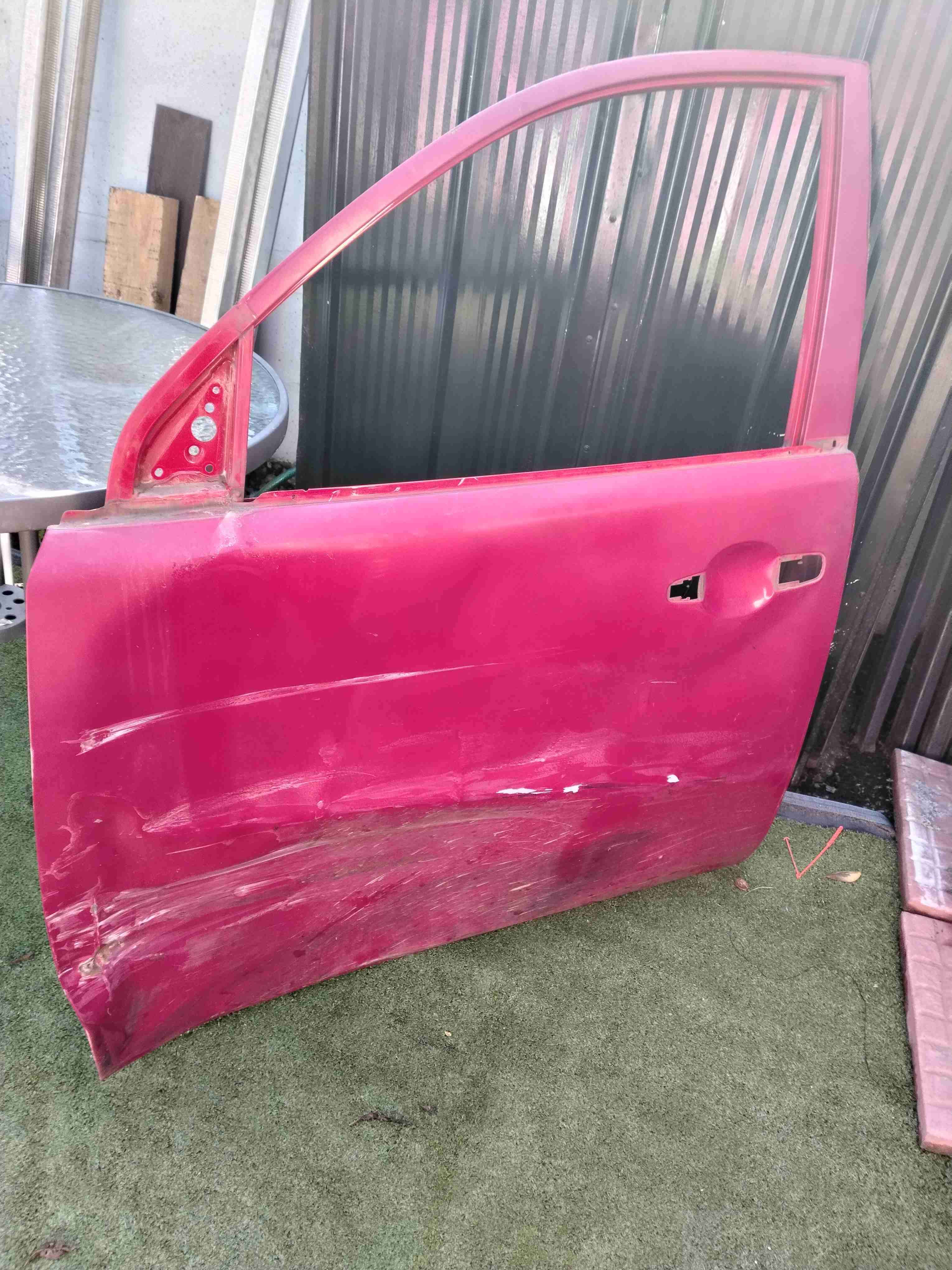 Puerta de camioneta L200 2012, abollada. - miniatura 2