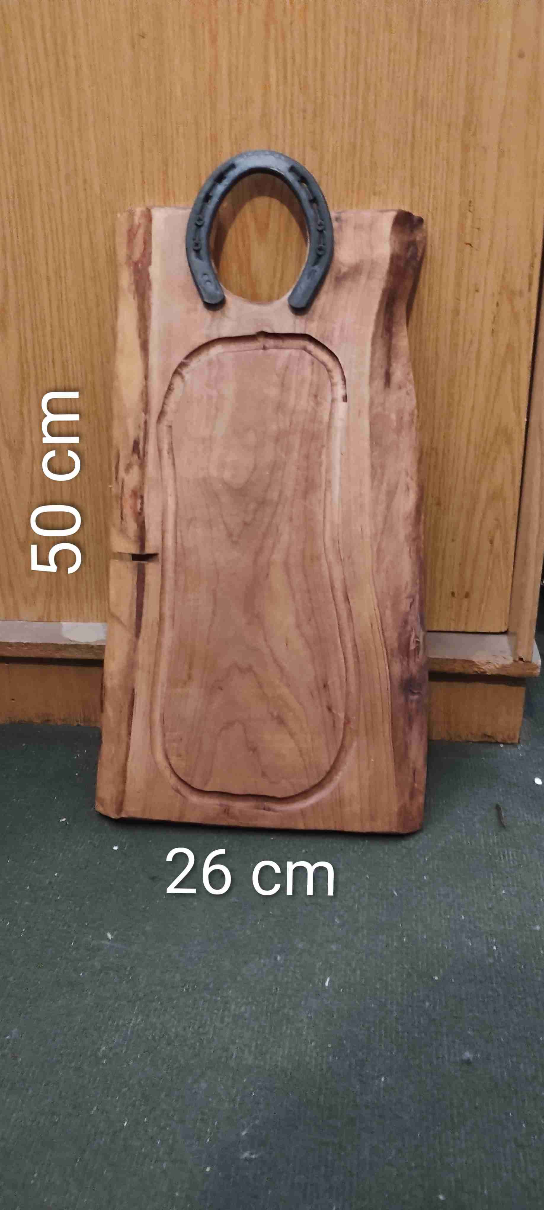 Tabla de madera con herradura