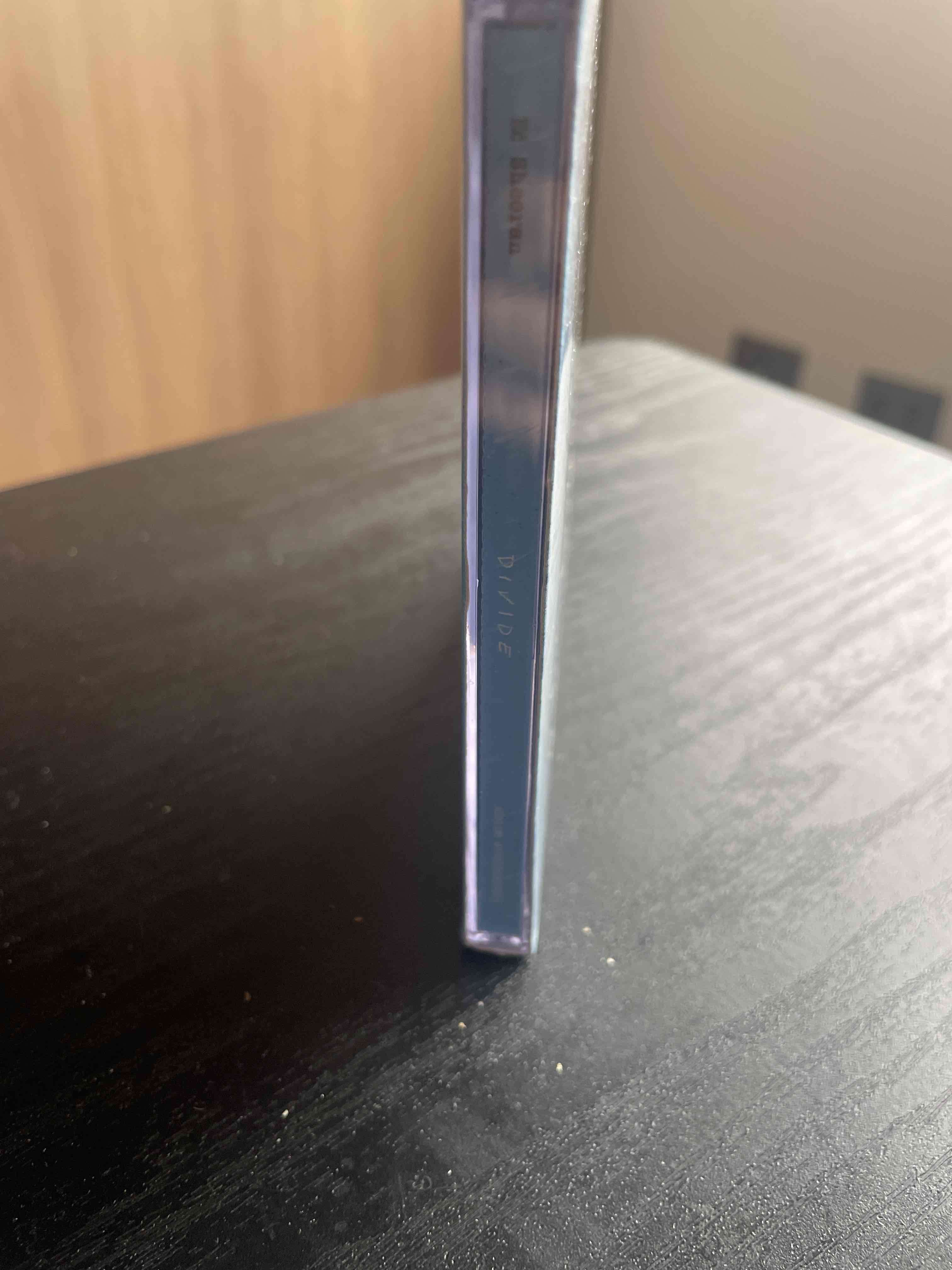 Álbum Divide en CD - miniatura 3