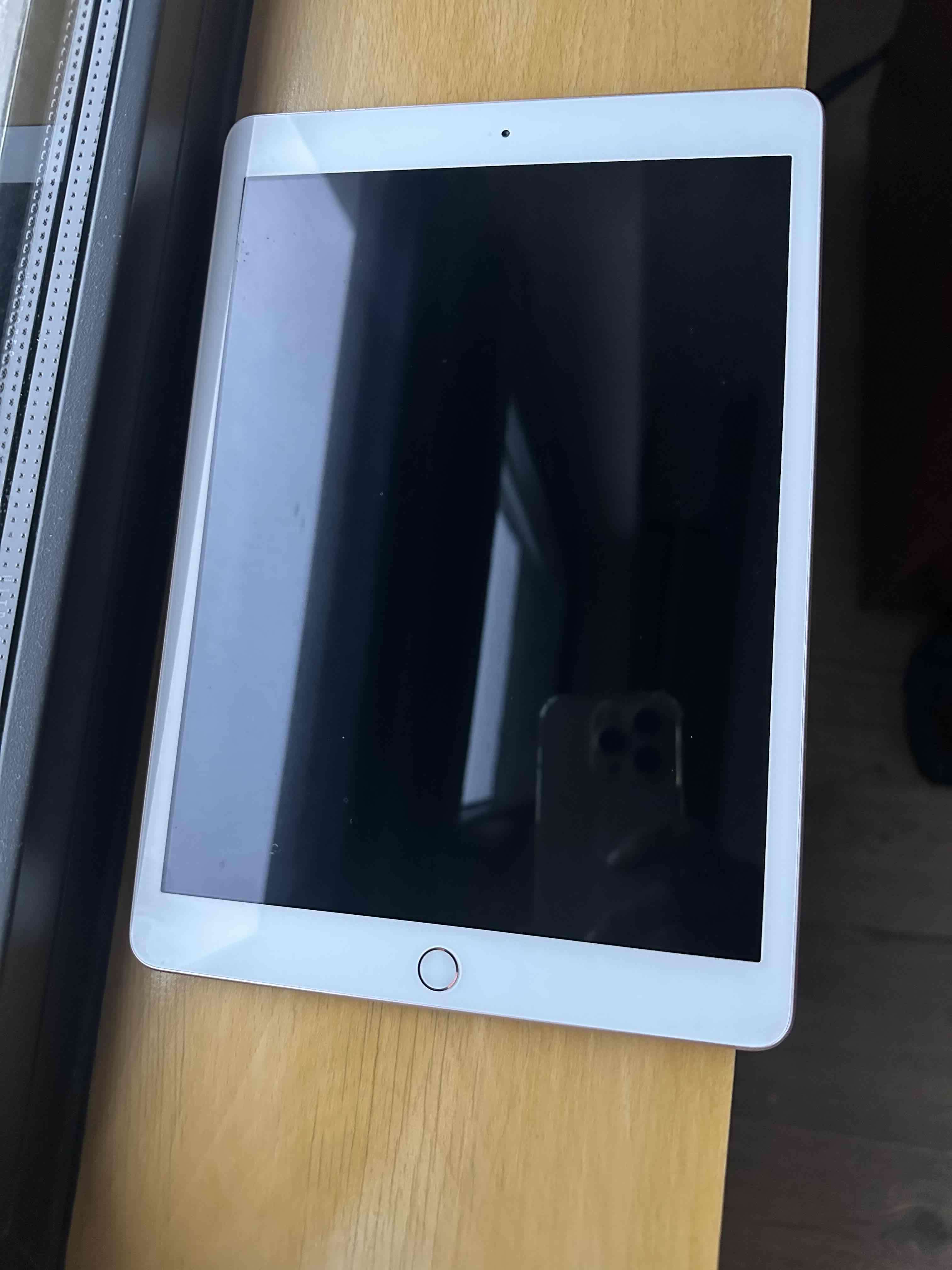 Tablet blanca de 10 pulgadas Apple - miniatura 1