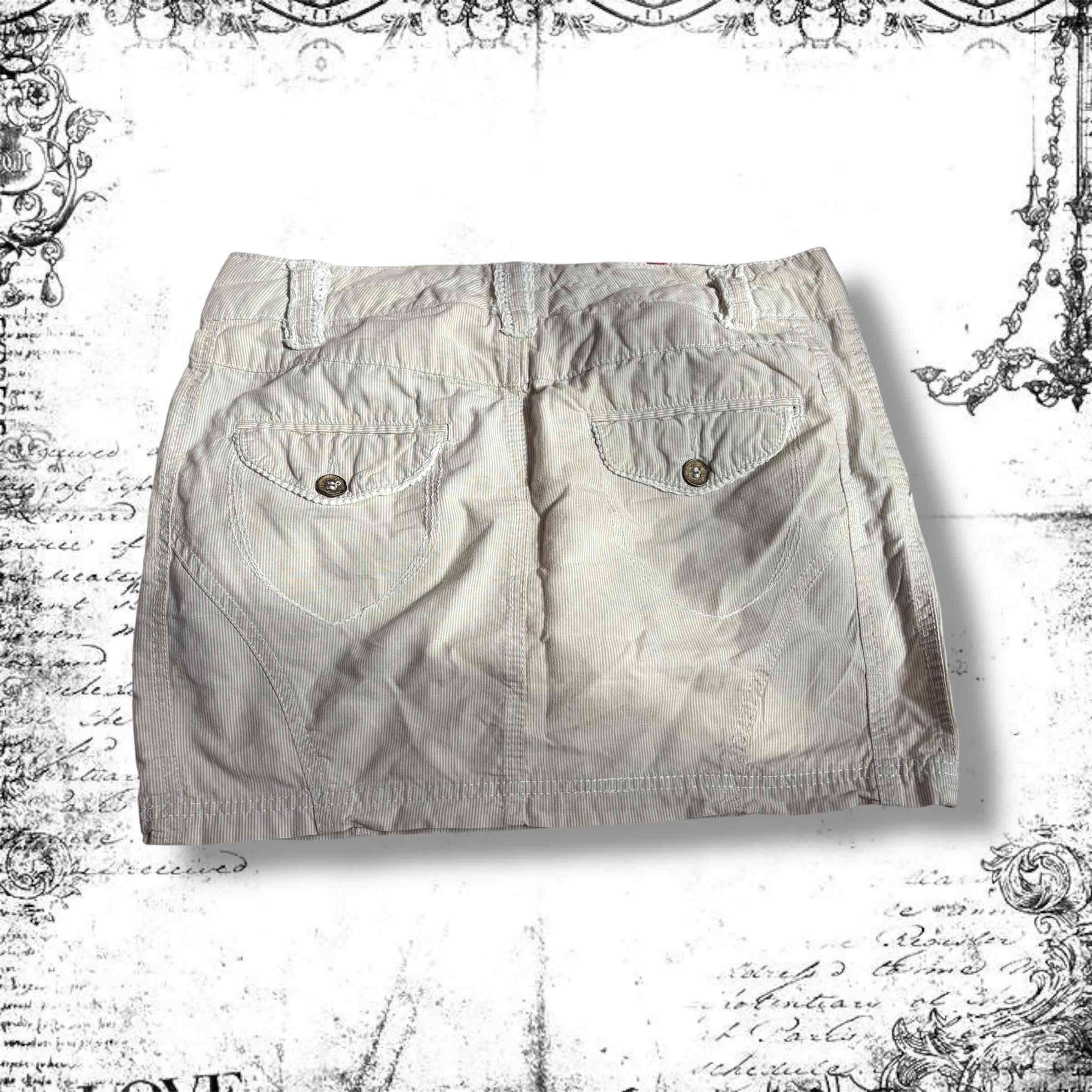 Falda corta beige - miniatura 2