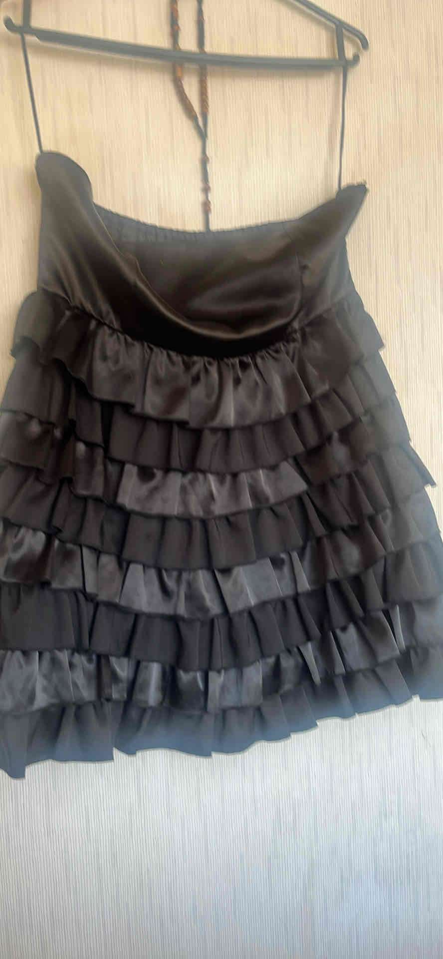 Mini falda negra con volantes - miniatura 1