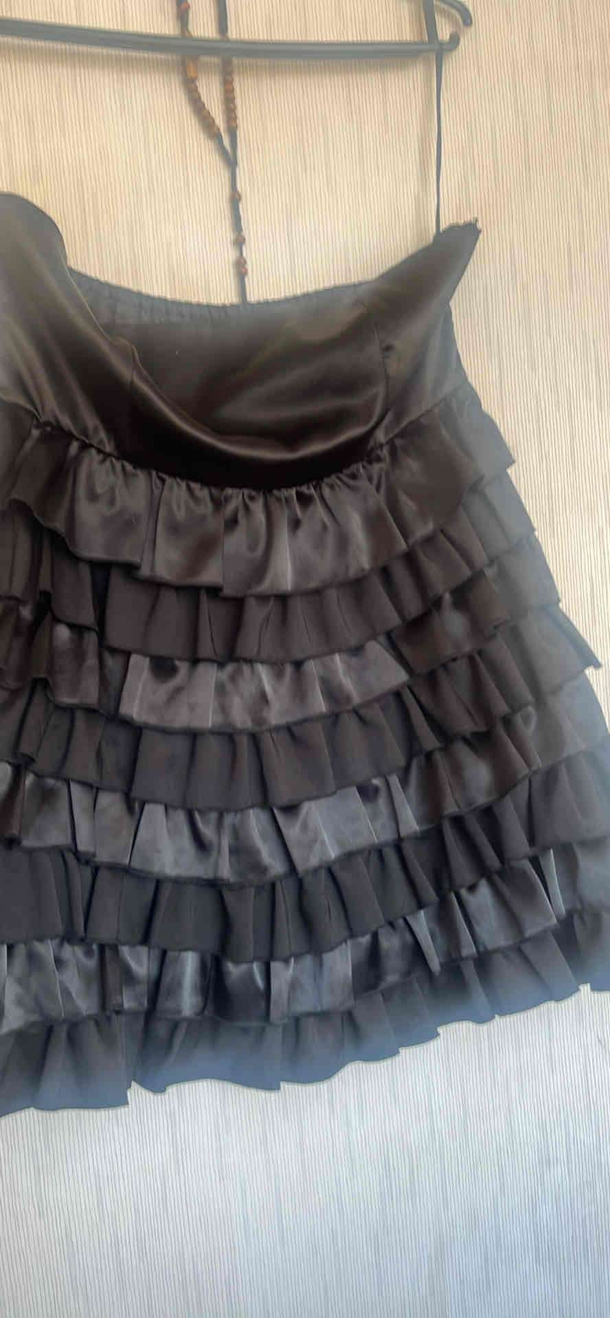 Mini falda negra con volantes - miniatura 2