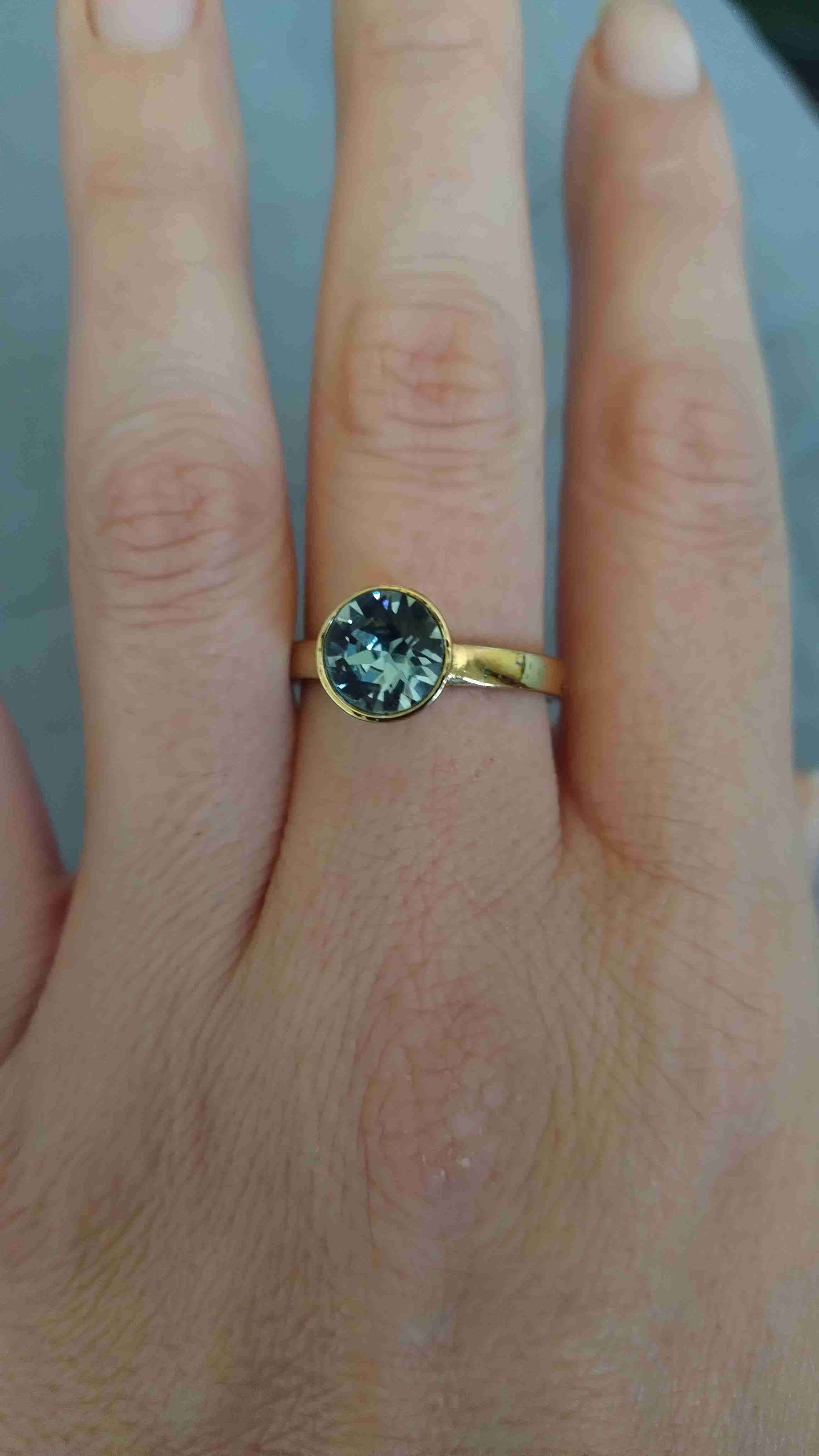 Anillo dorado con piedra azul - miniatura 4