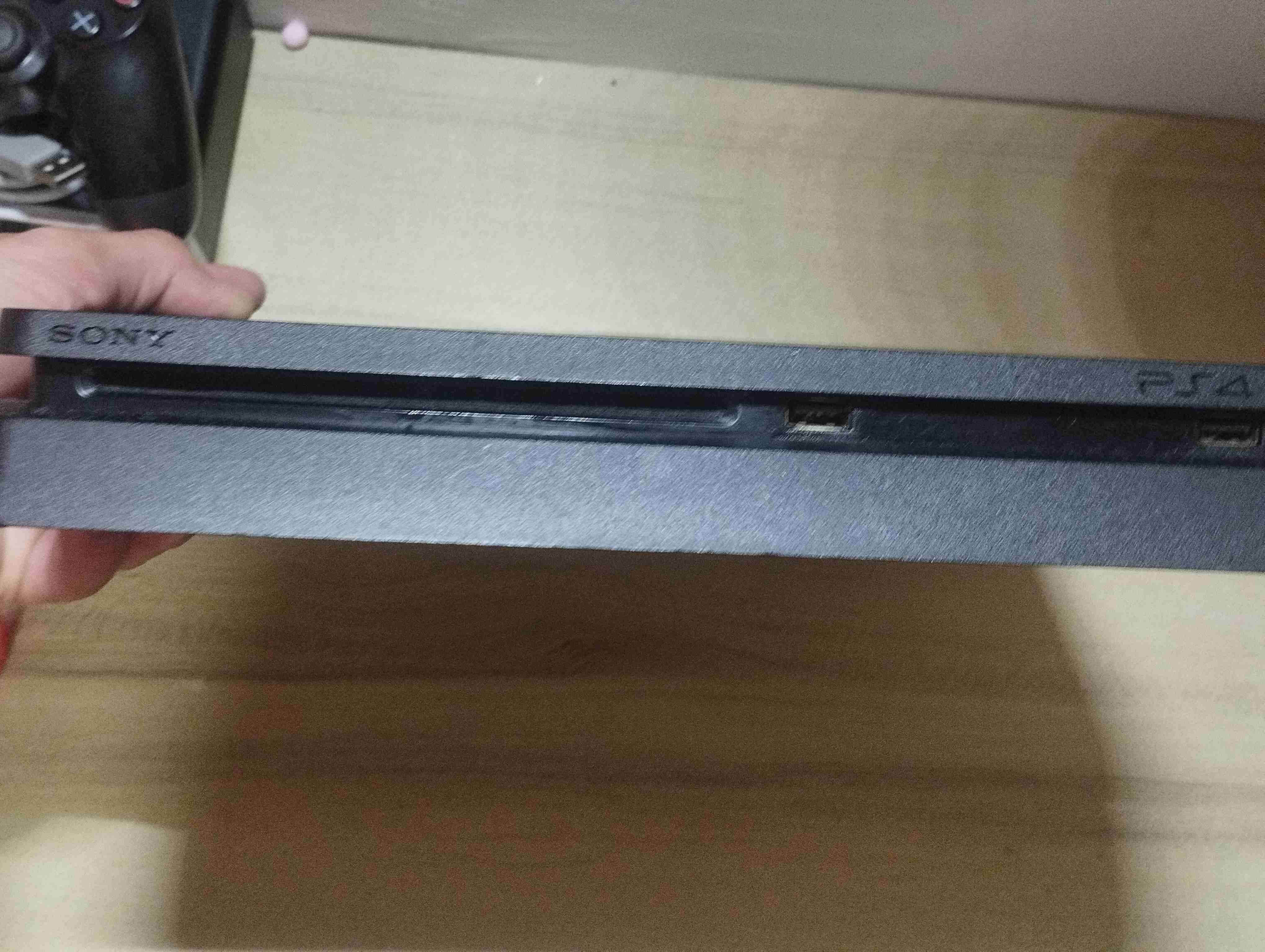 Consola de videojuegos negra - miniatura 3