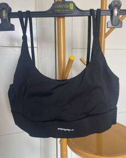 Top deportivo negro marca Raak - miniatura 1