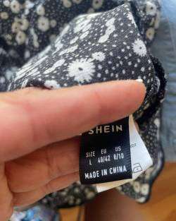 Falda corta floreada negra - miniatura 4