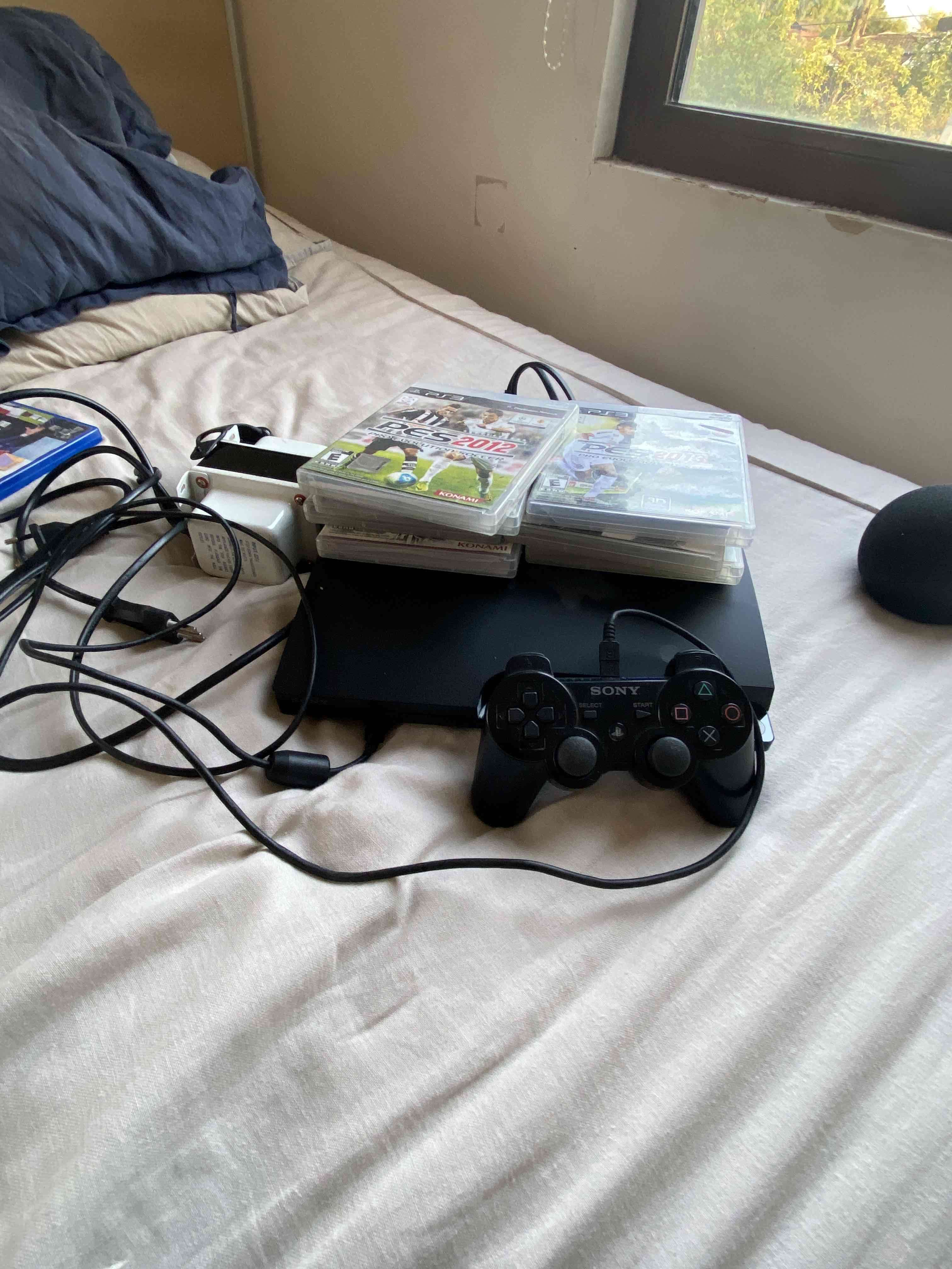 Consola Sony PlayStation 3 con juegos