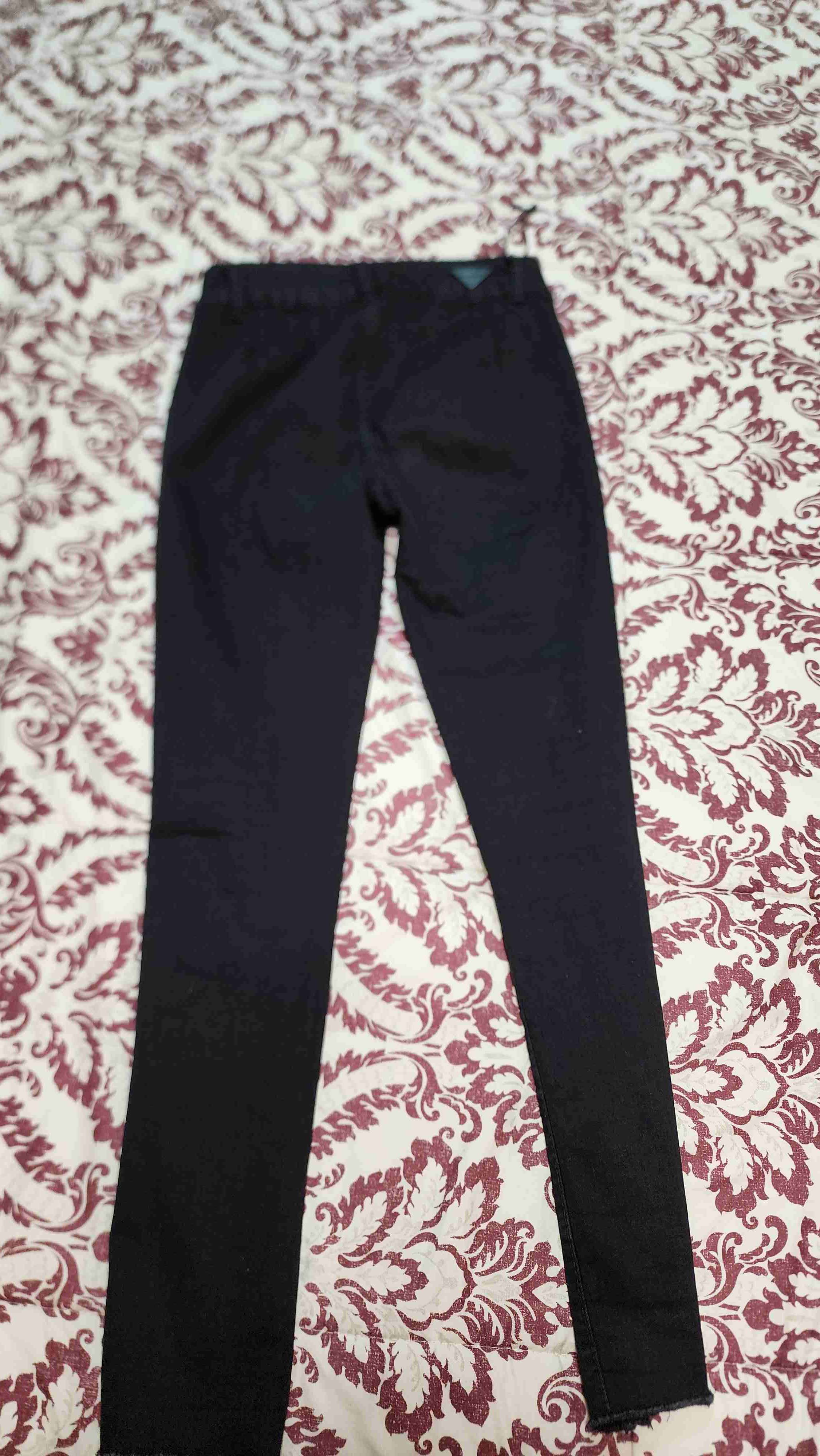 Pantalones negros con cierre dorado - miniatura 2