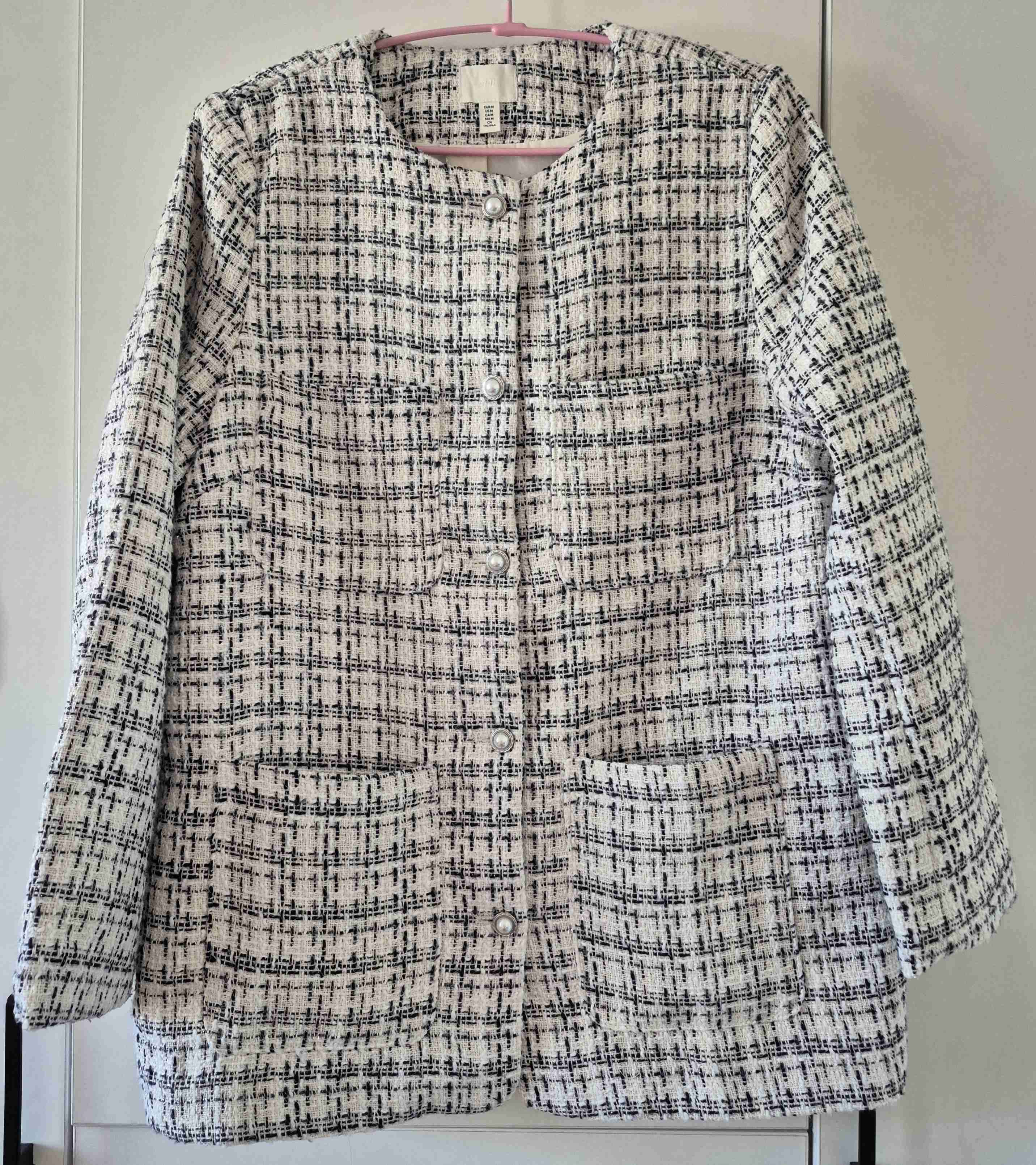 Abrigo tejido blanco y negro - miniatura 1