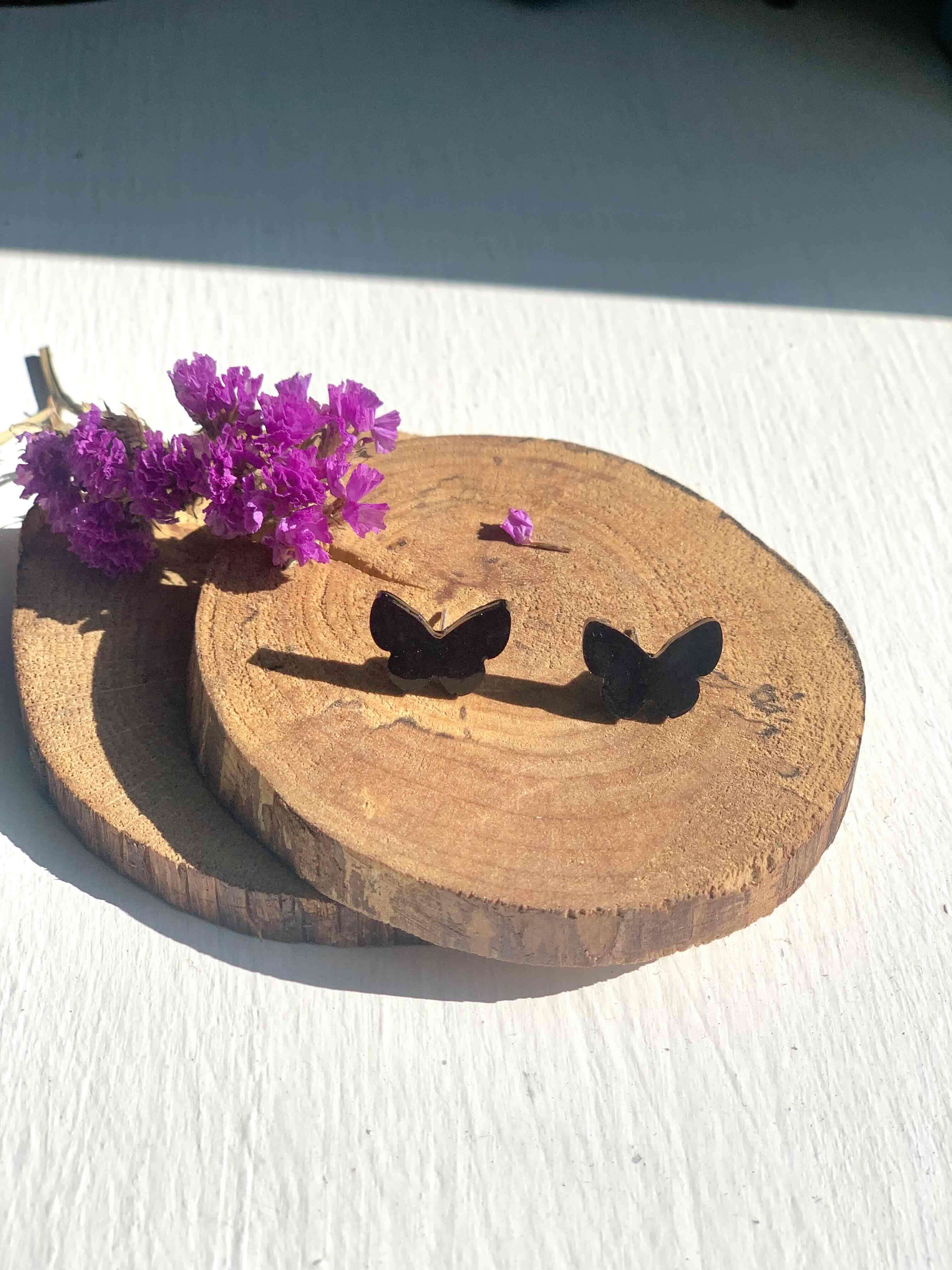 Aros de mariposa negros