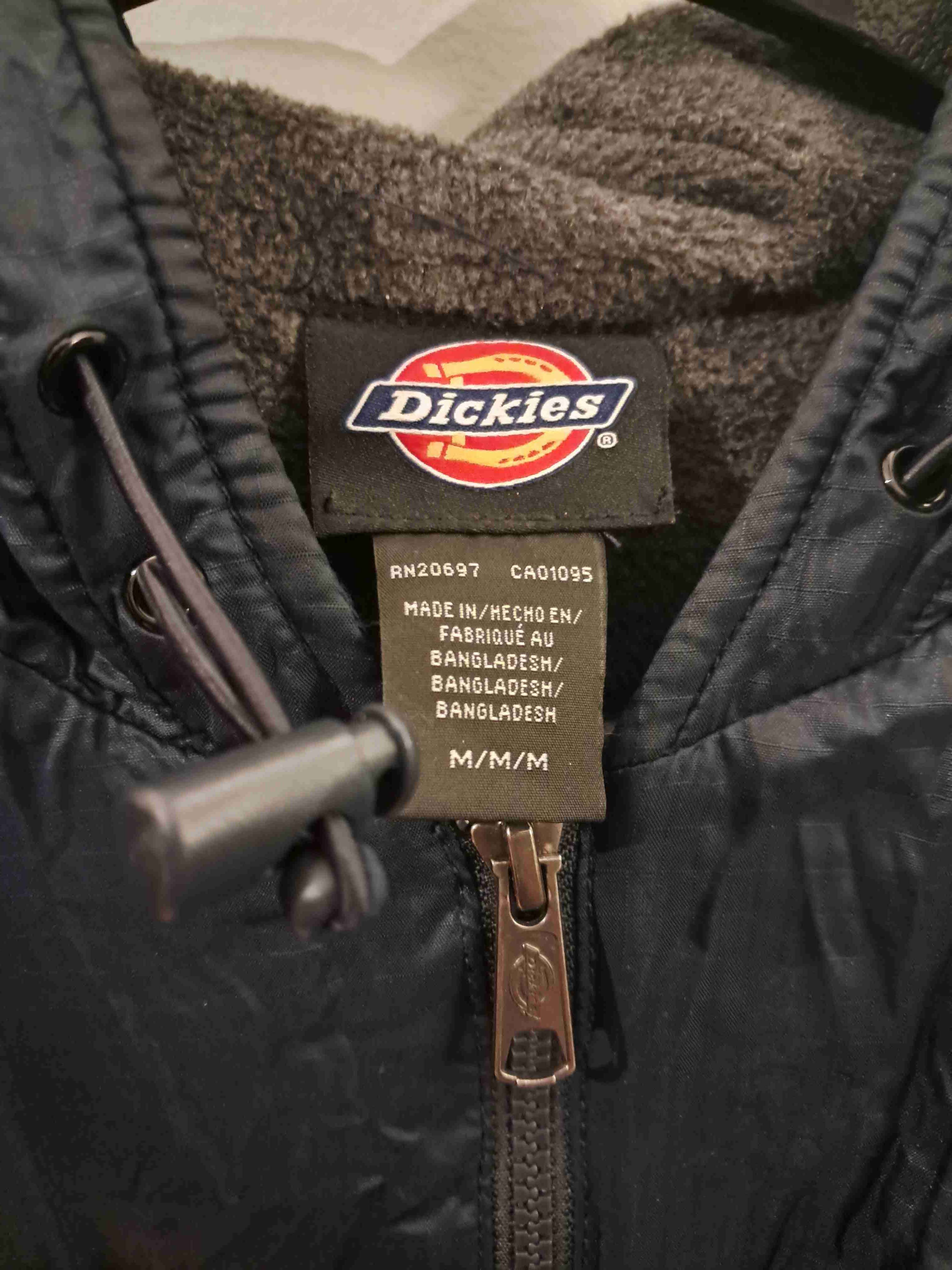 Chaqueta azul con capucha - miniatura 3