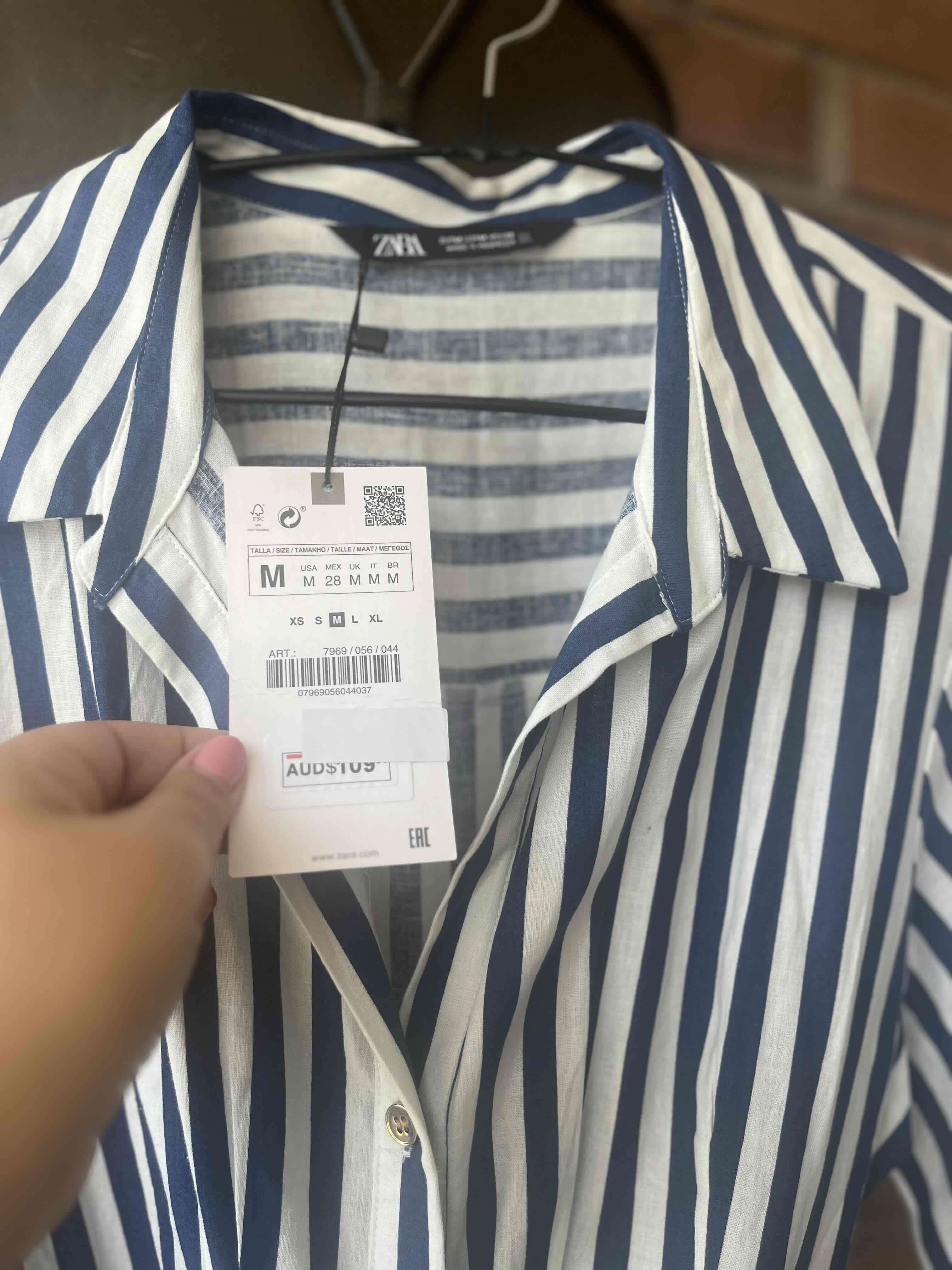Camisa rayada azul y blanca - miniatura 1