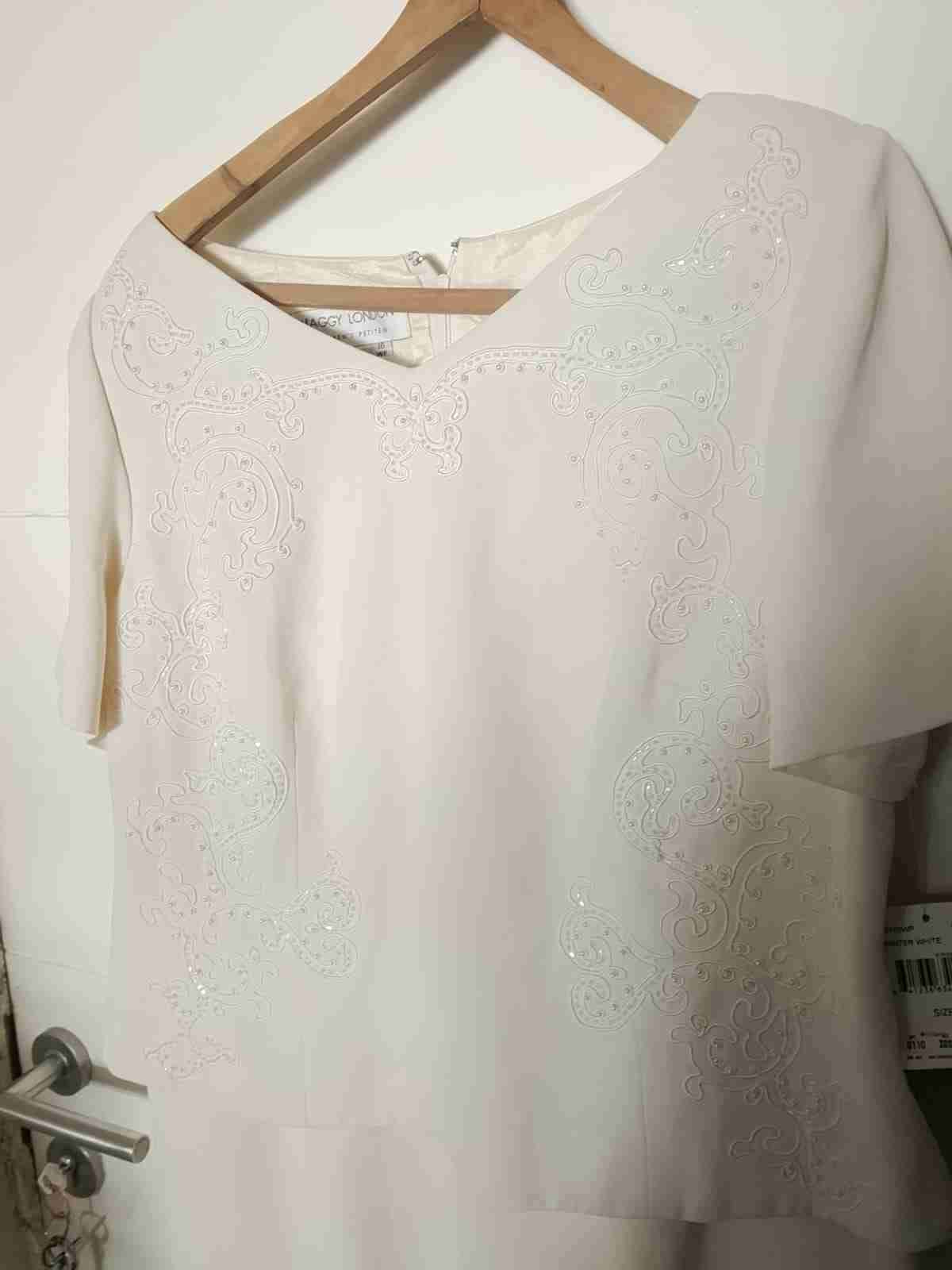 Vestido blanco con bordados - miniatura 4