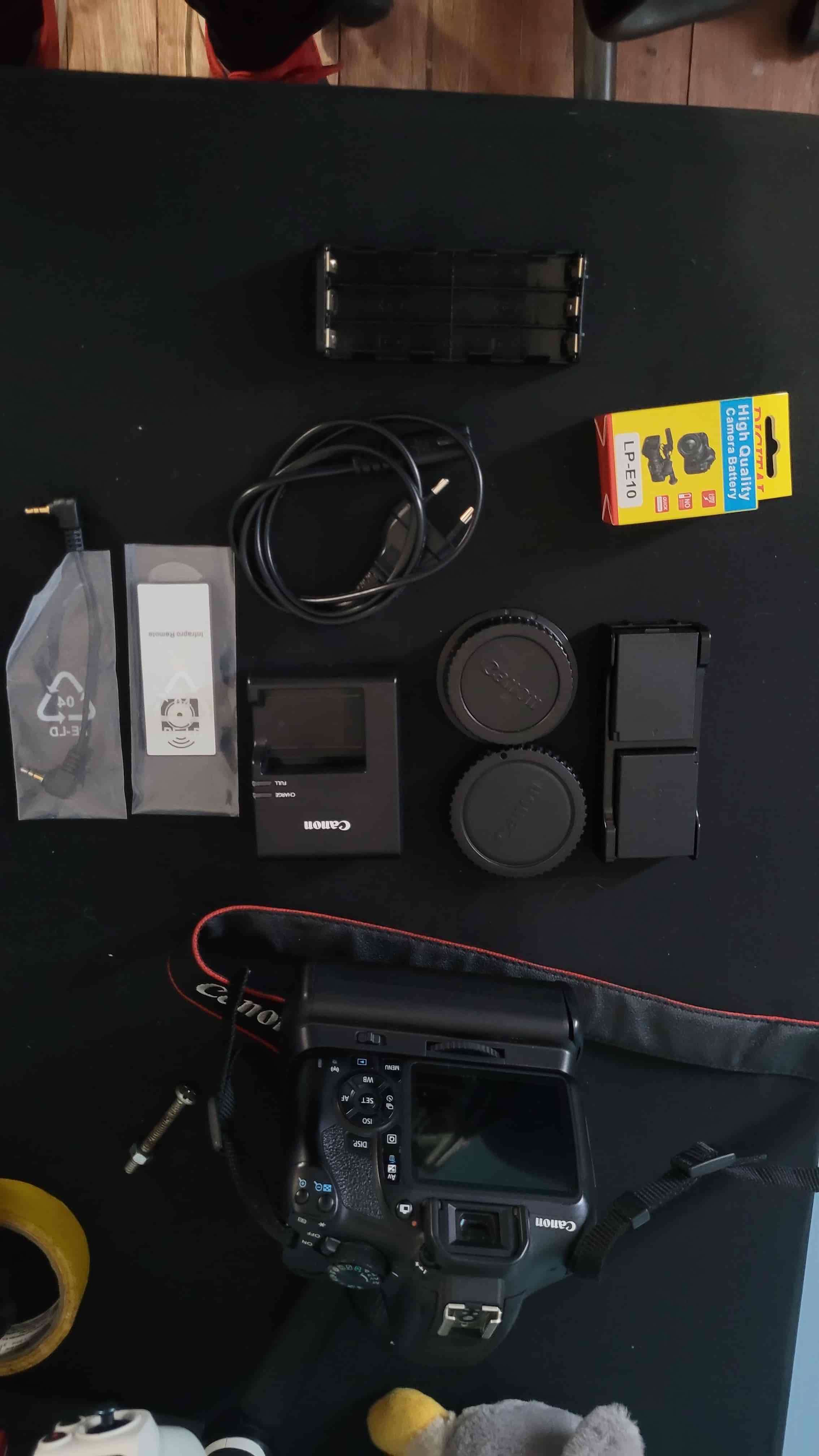 Cámara Canon con accesorios - miniatura 1