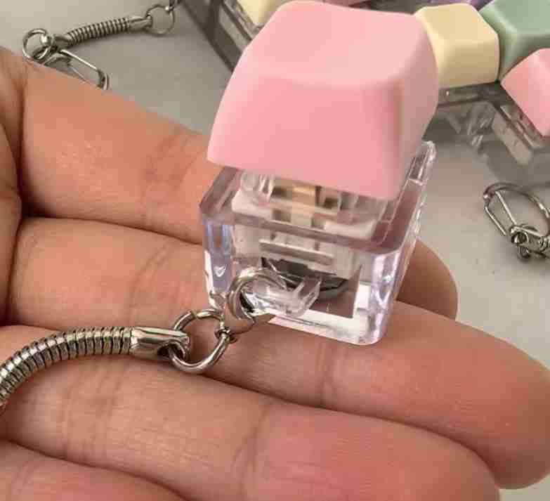 Llavero con mini teclado antiestrés - miniatura 1