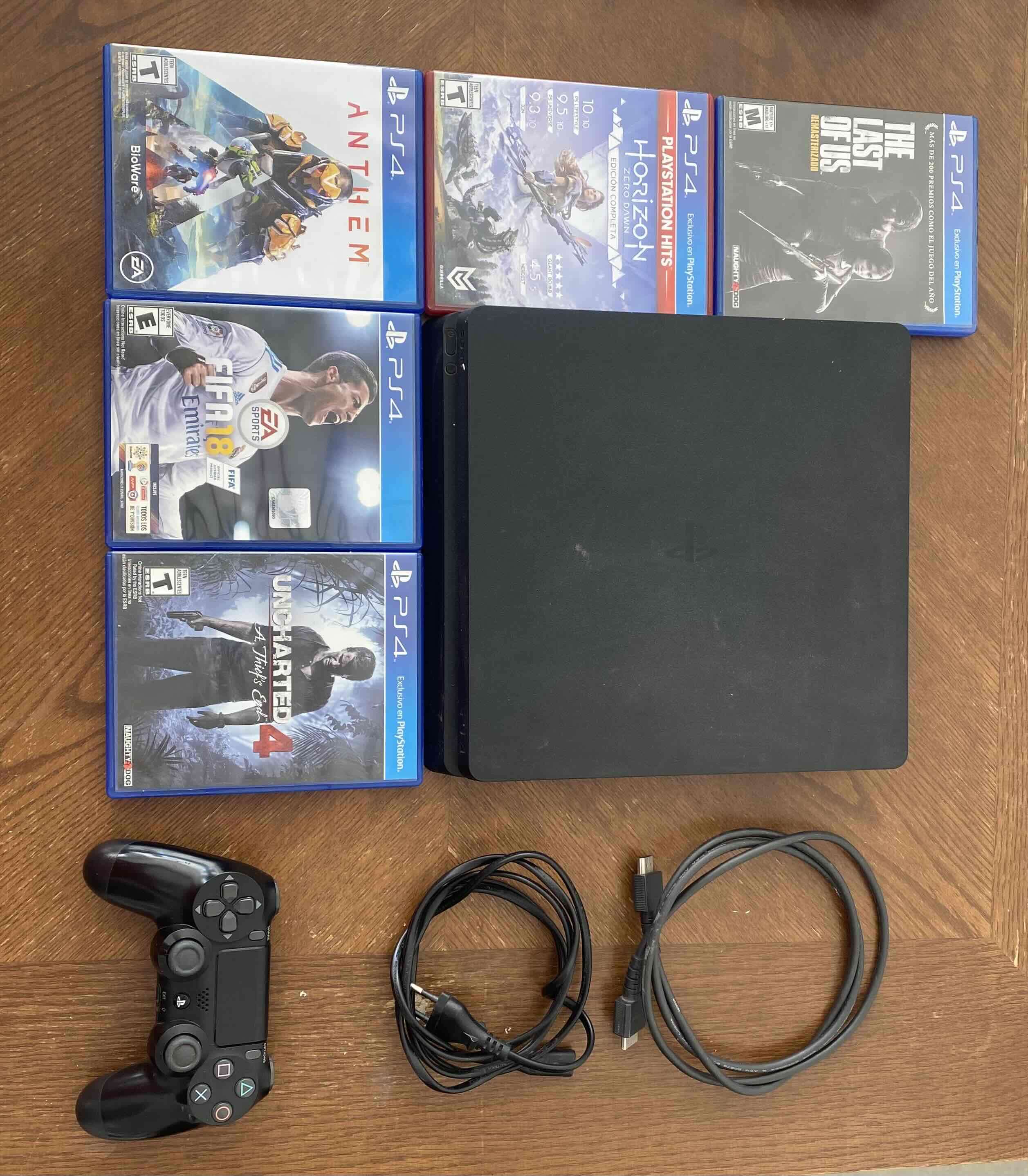 Consola PS4 1 tb con 5 juegos y control