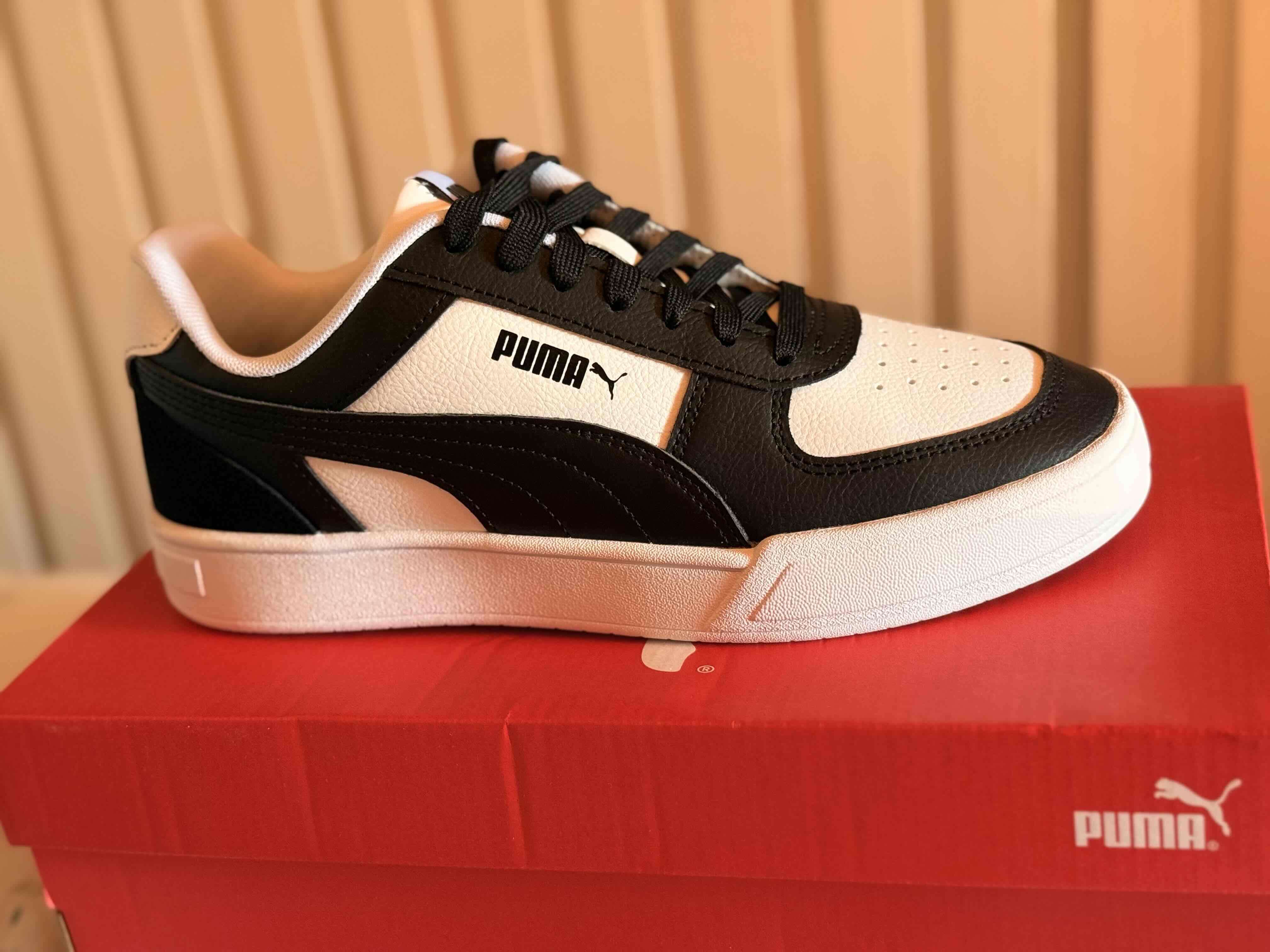 Zapatillas Puma blancas y negras - miniatura 1