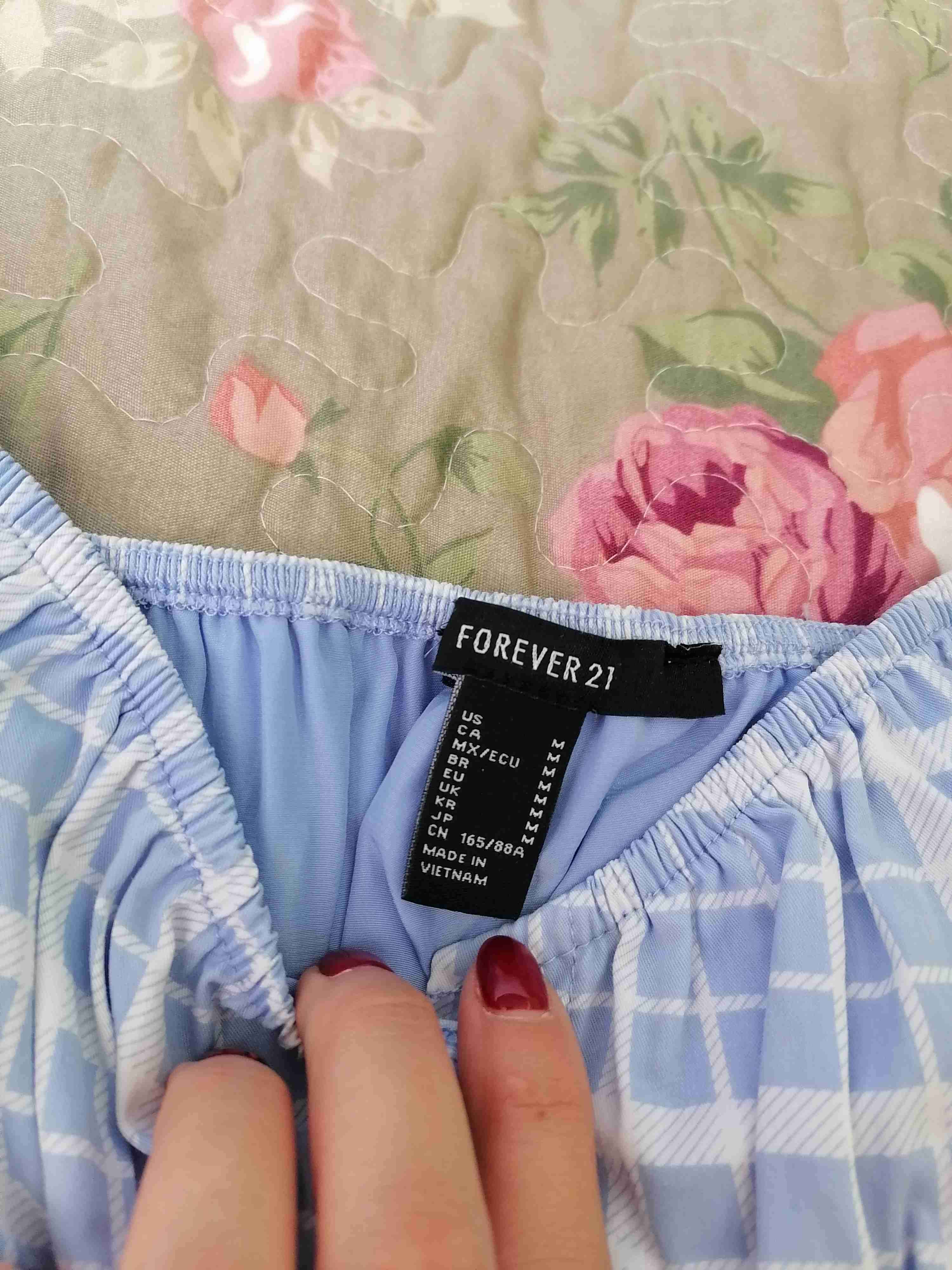 Blusa azul a cuadros con volantes - miniatura 2