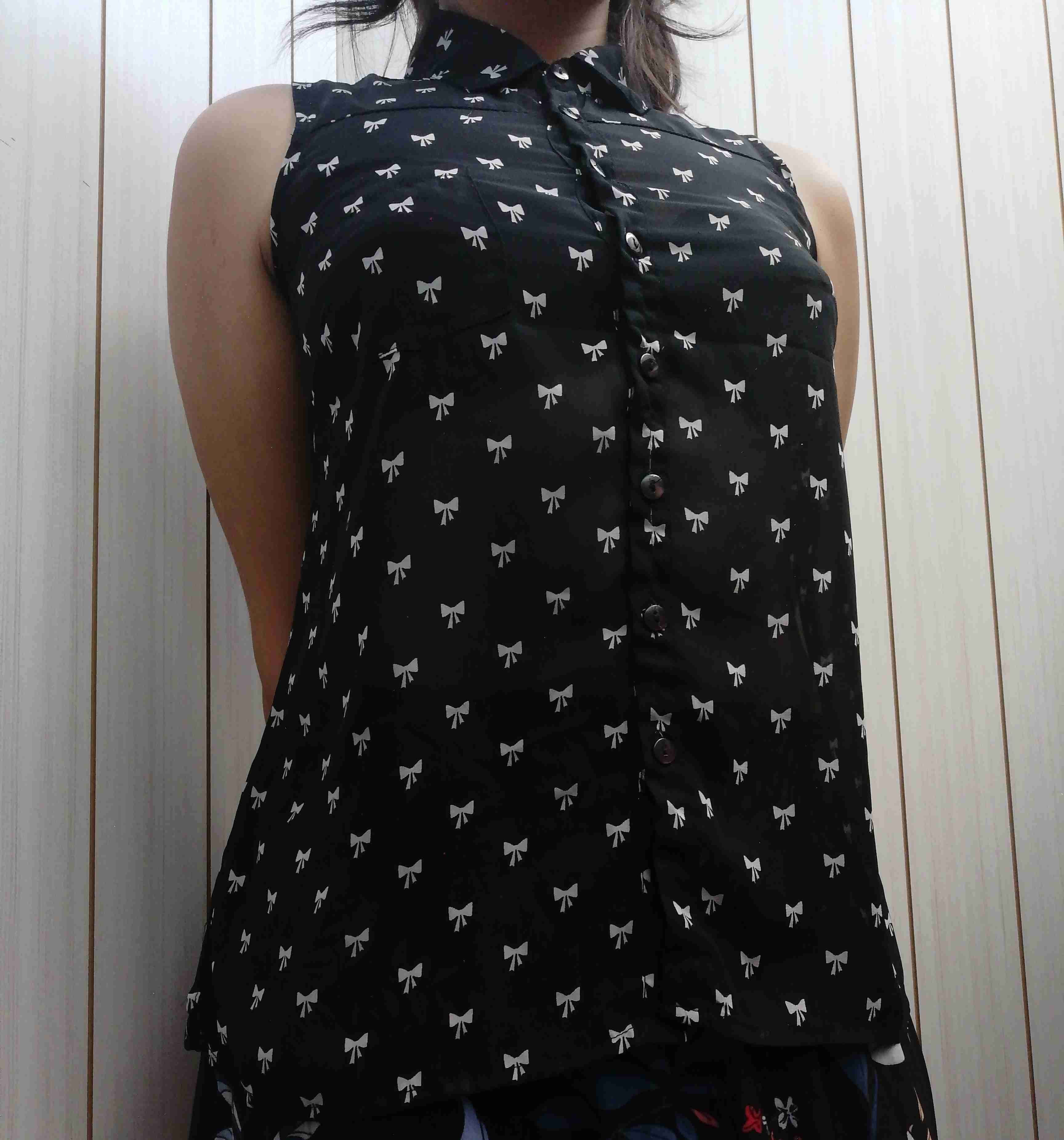 Blusa sin mangas con lazos - miniatura 4